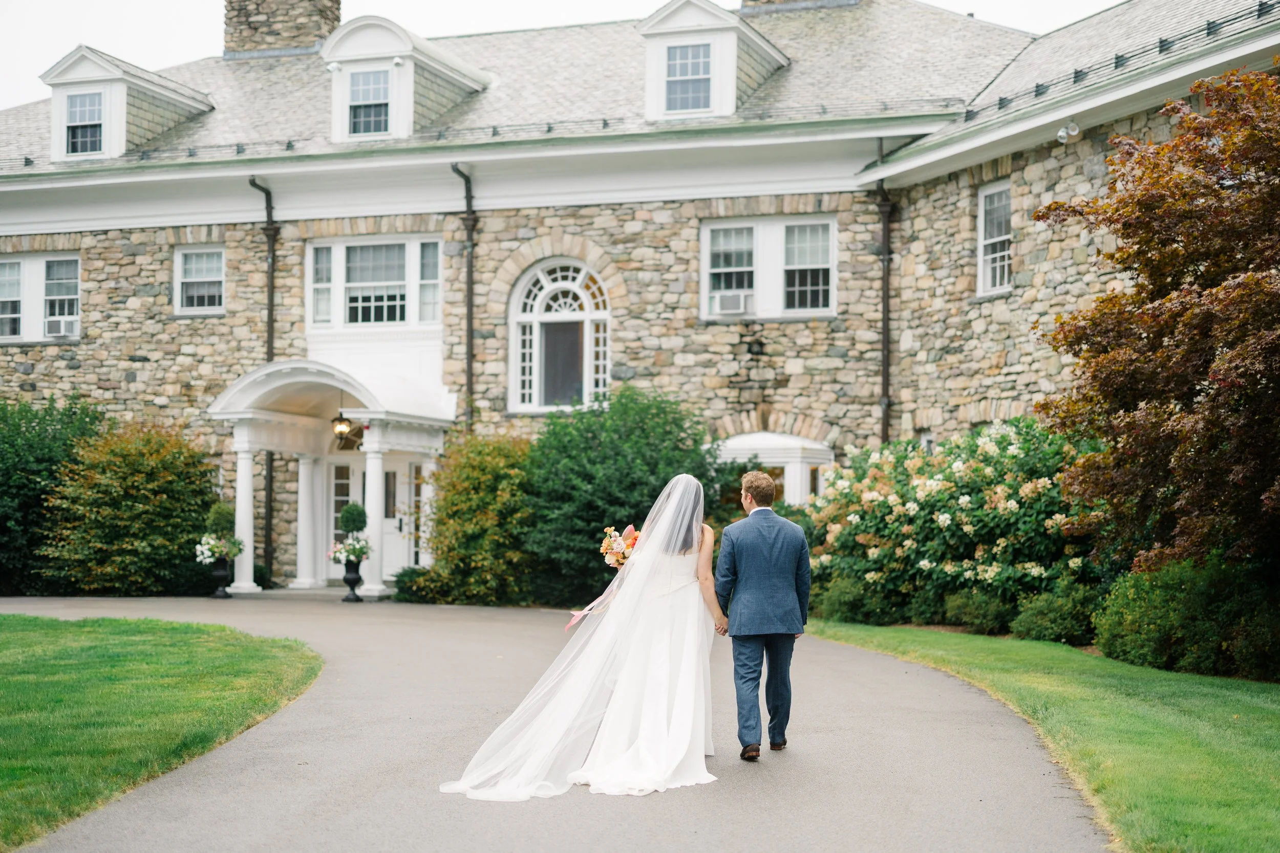 Colorful wedding portraits featuring lush dahlias, English roses, and poppies.