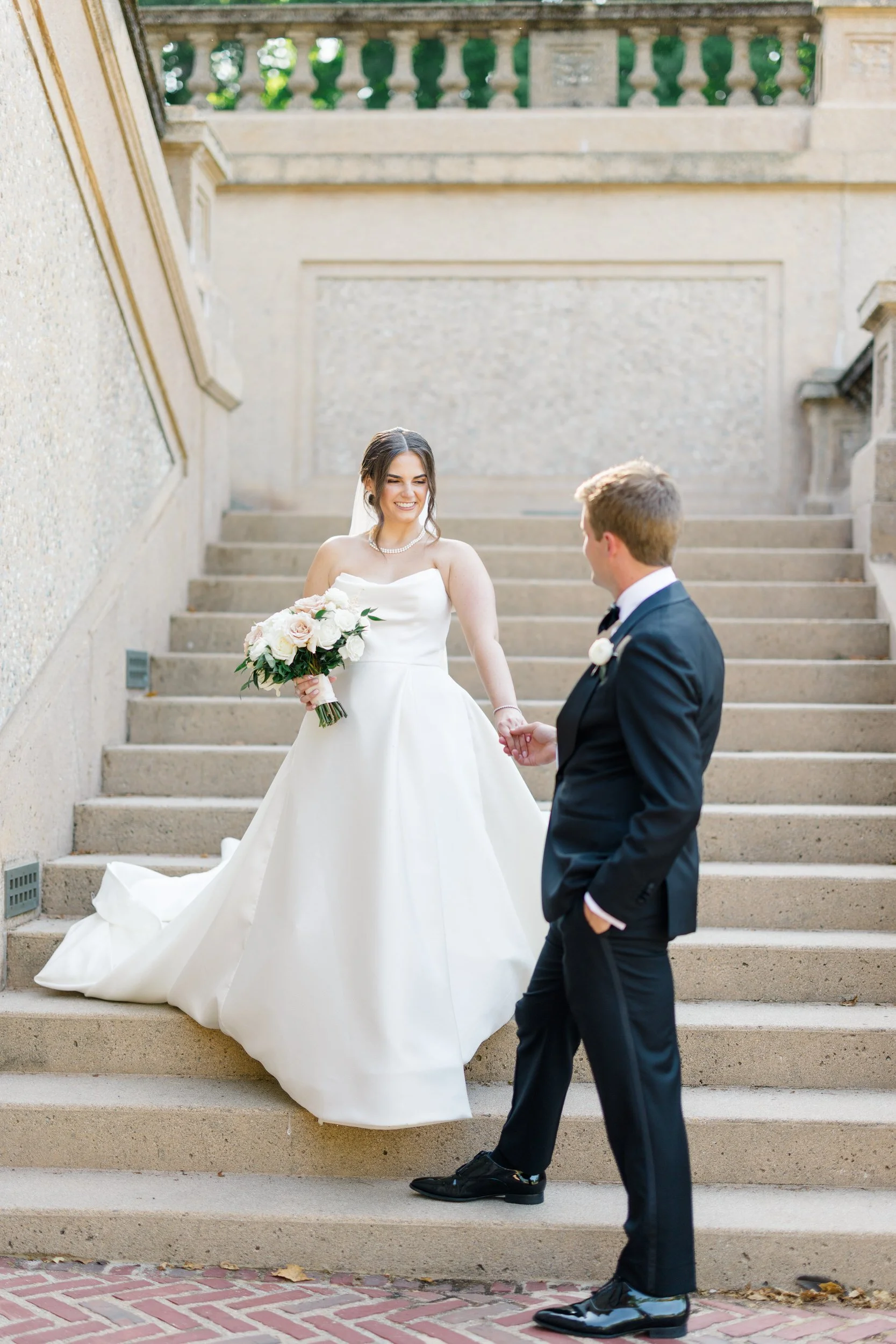 Editorial portraits of the couple in front of the historic Great House at Castle Hill on the Crane Estate.