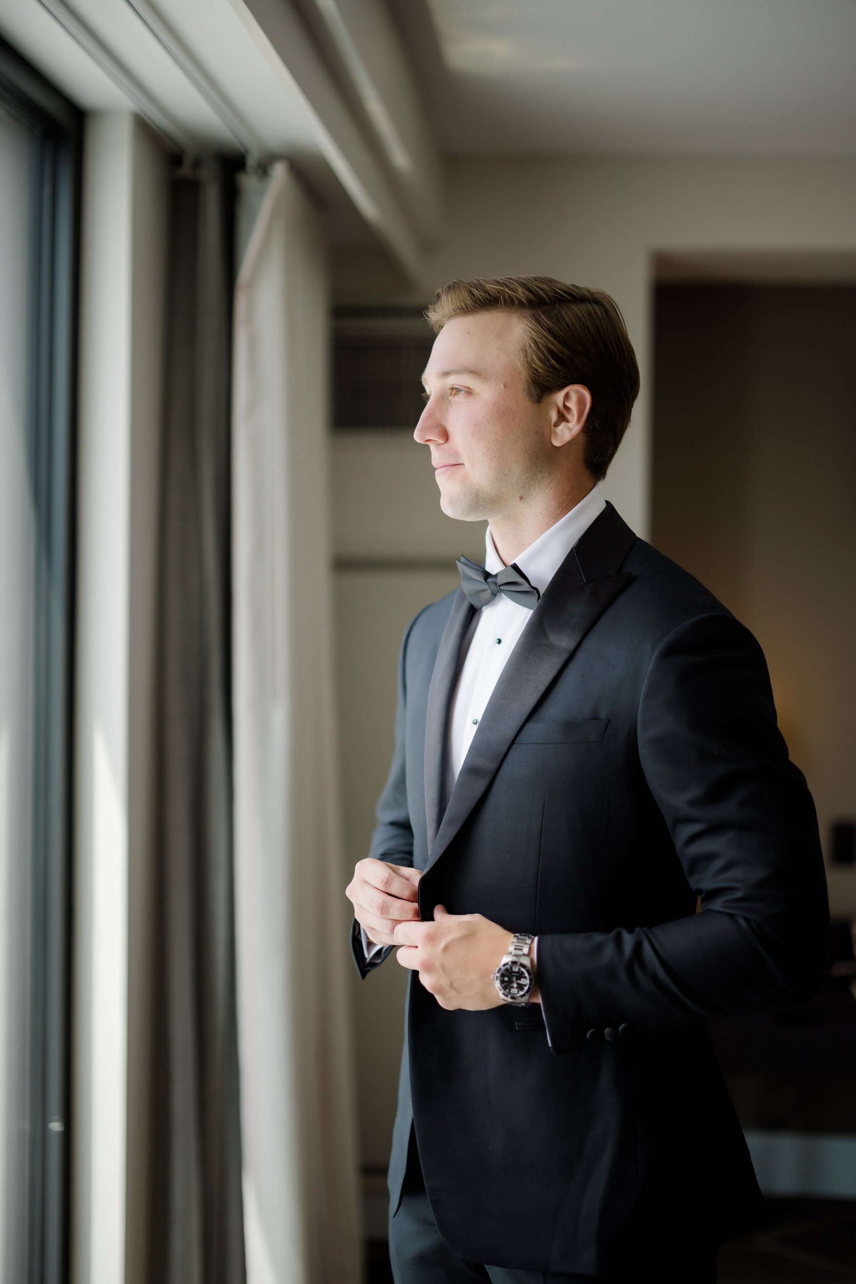 Groom getting ready at Hotel Commonwealth before his Elm Bank wedding