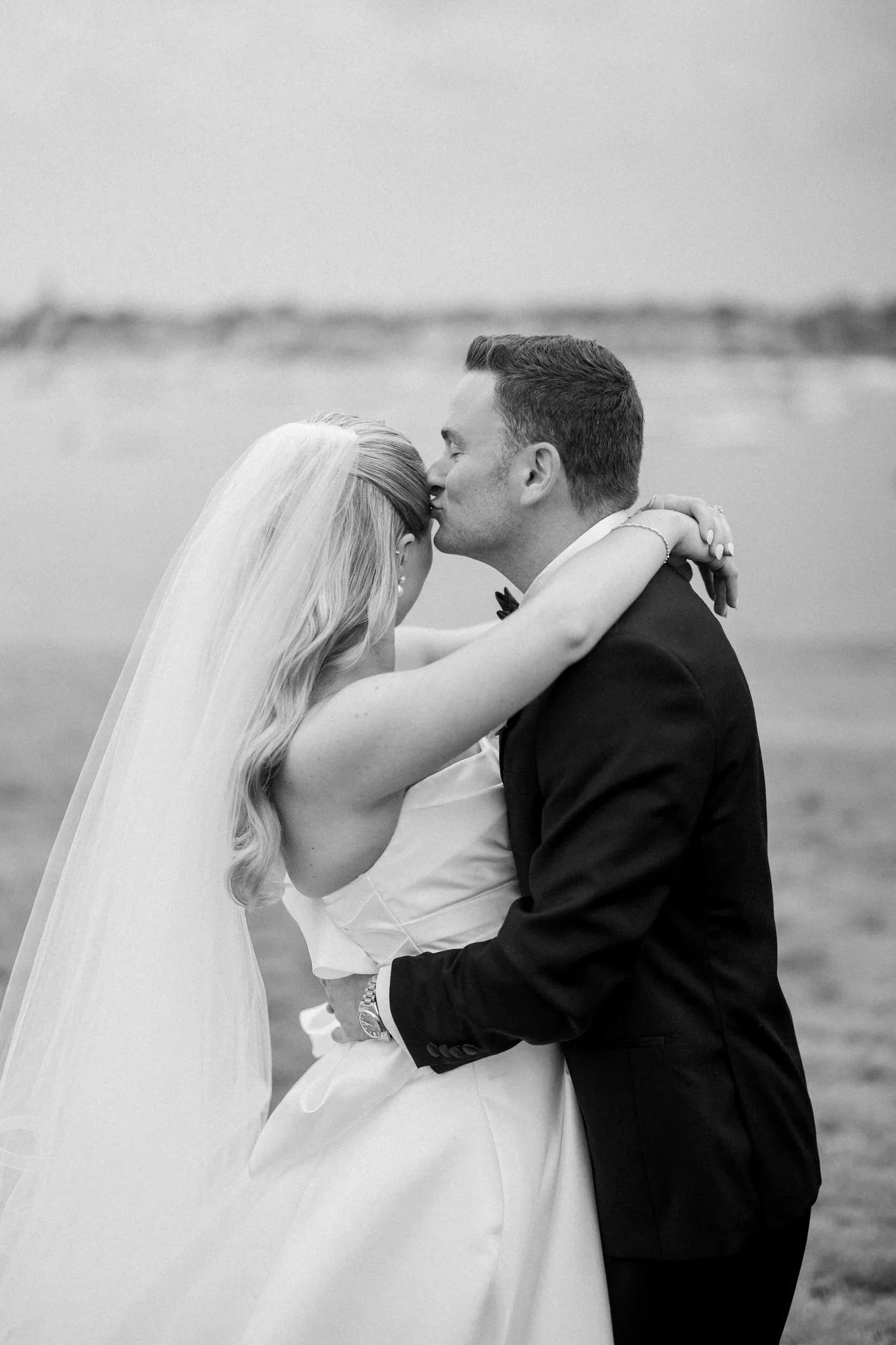 Bride and groom wedding portraits at Chandler Hovey Park in Marblehead, Massachusetts.