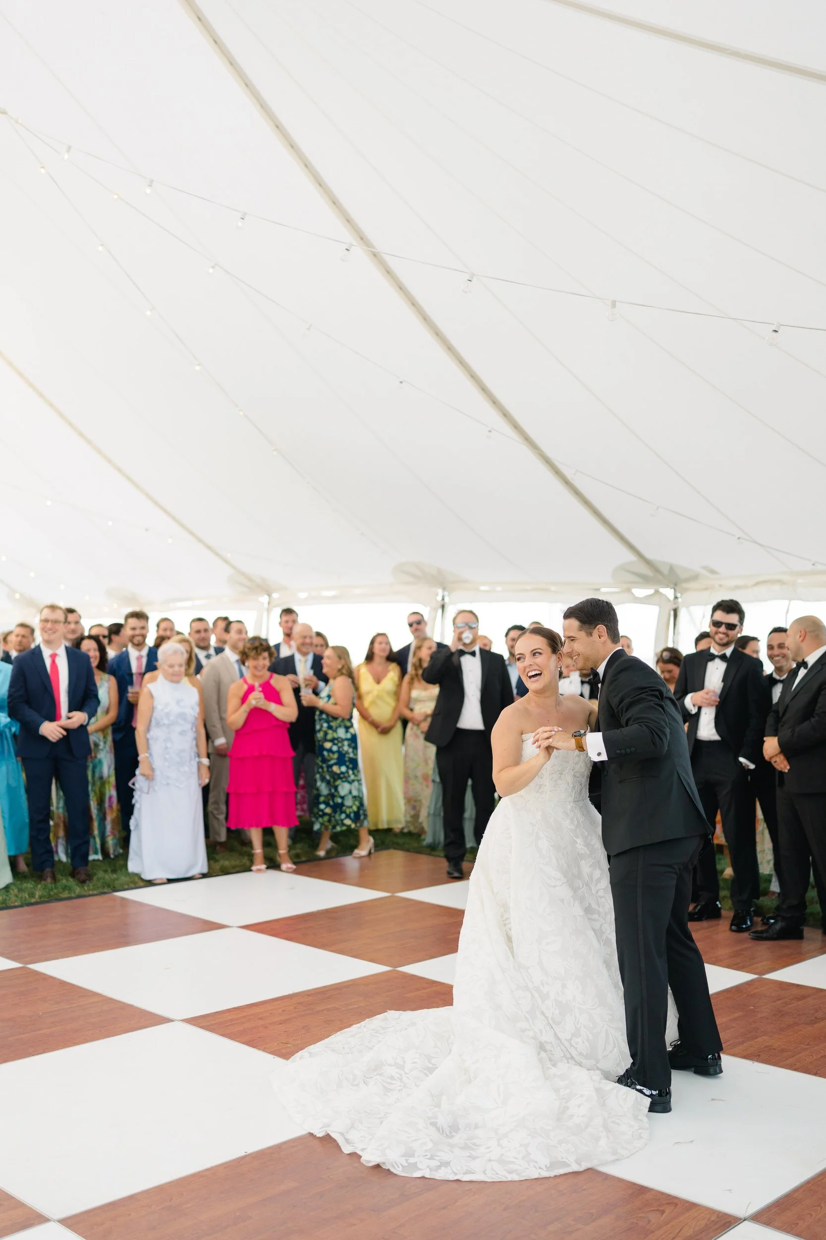 Bride and groom celebrating on the dance floor.