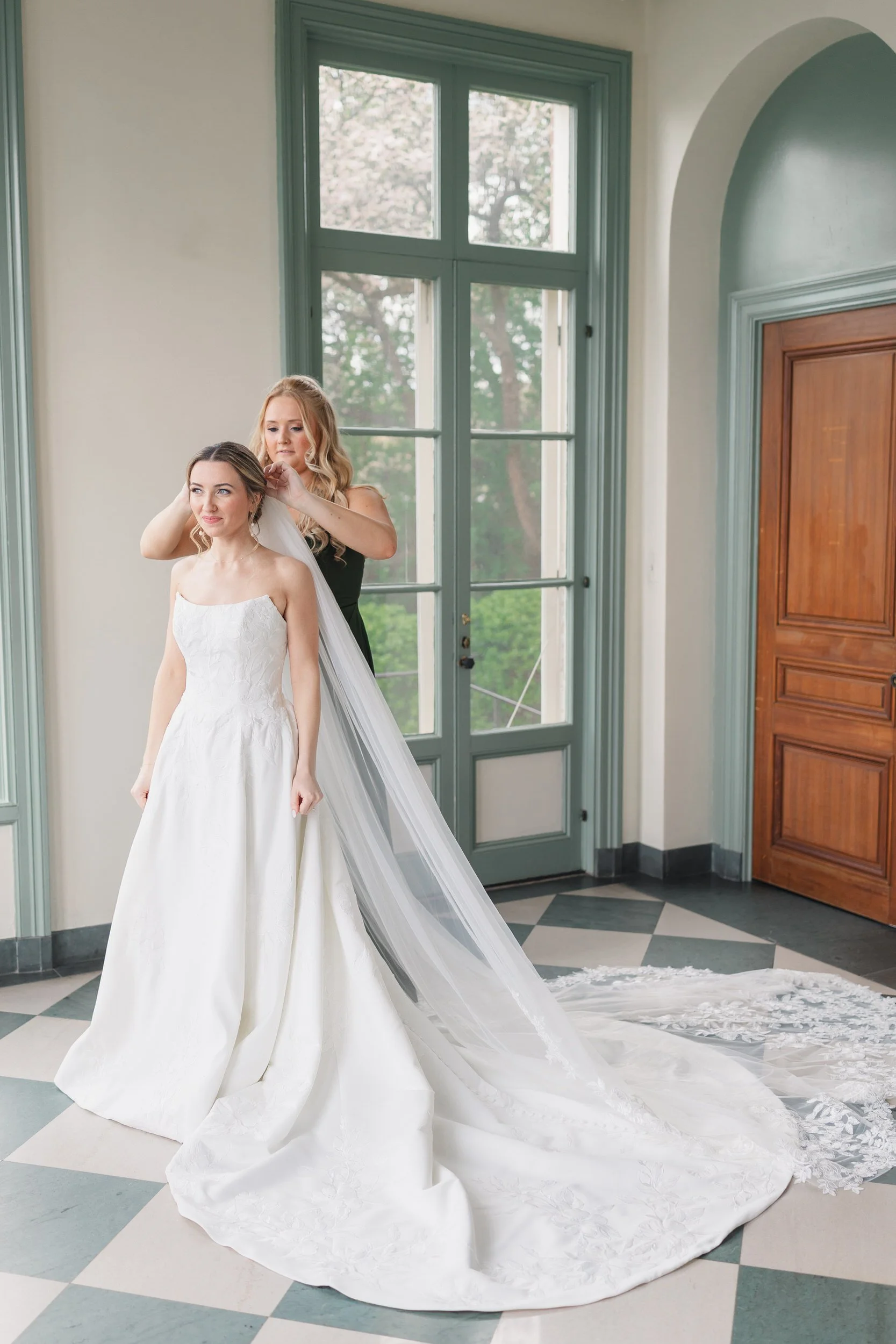 Elegant bride getting ready in coastal Massachusetts wedding venue suite