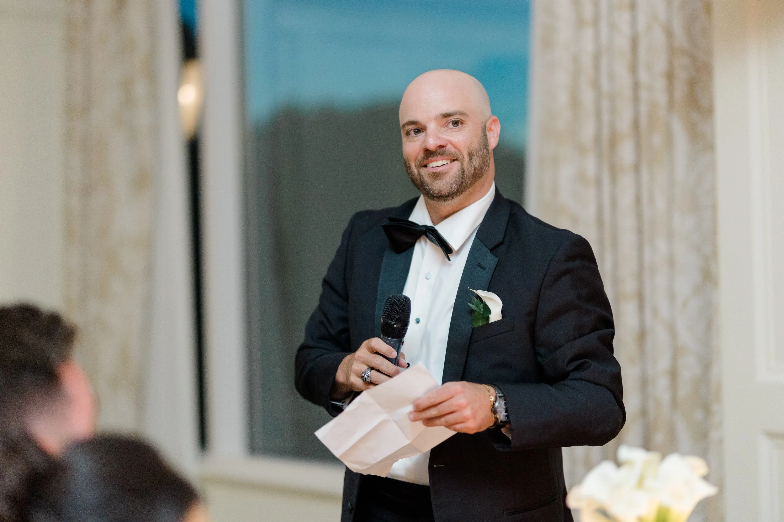 Guests enjoying dinner and speeches during the reception