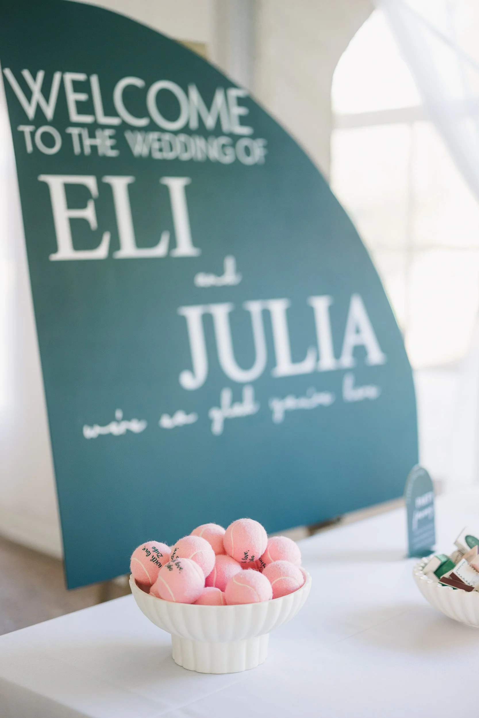 Editorial wedding reception details with modern floral palette