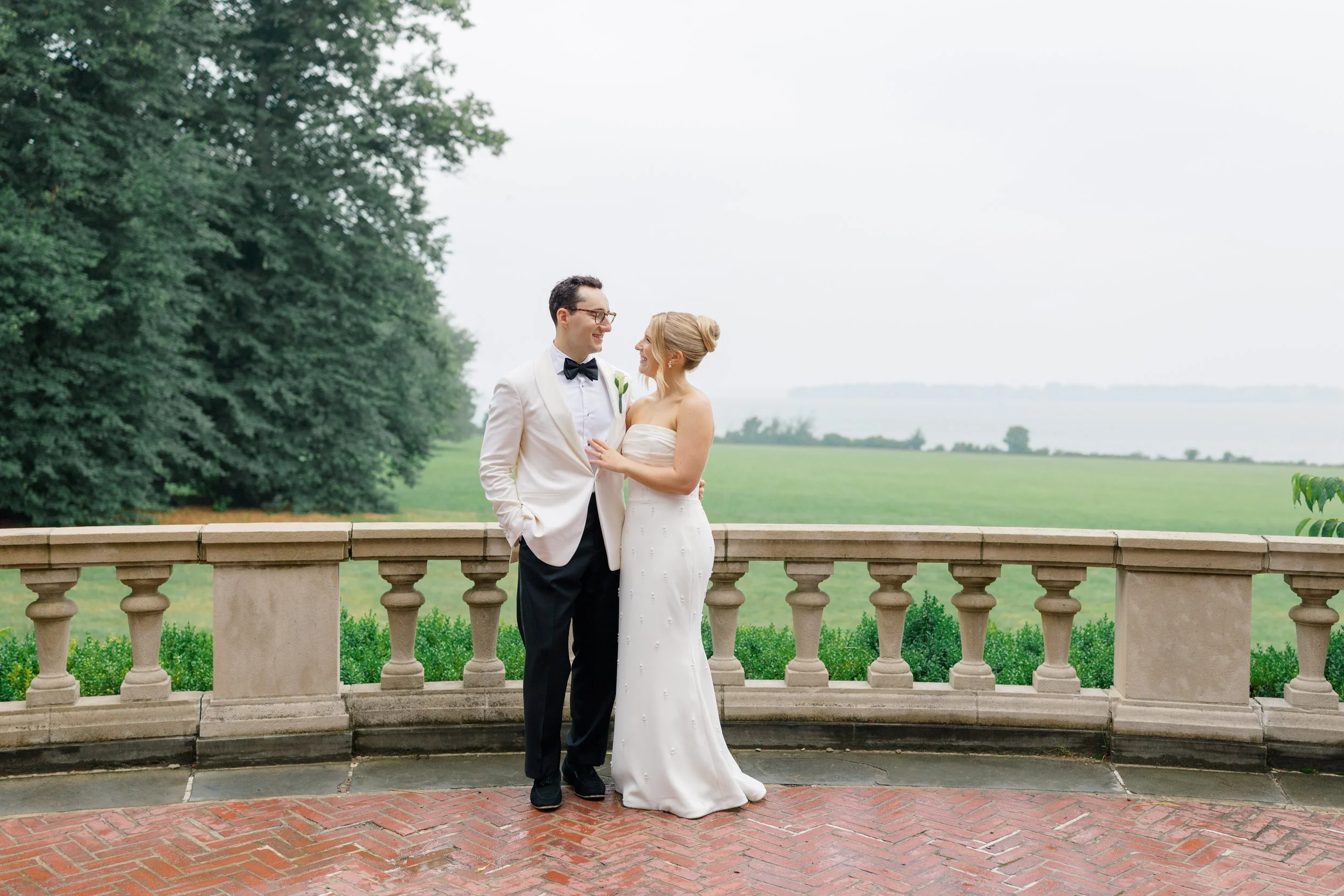 Romantic evening portraits captured after a rainy Blithewold Wedding.