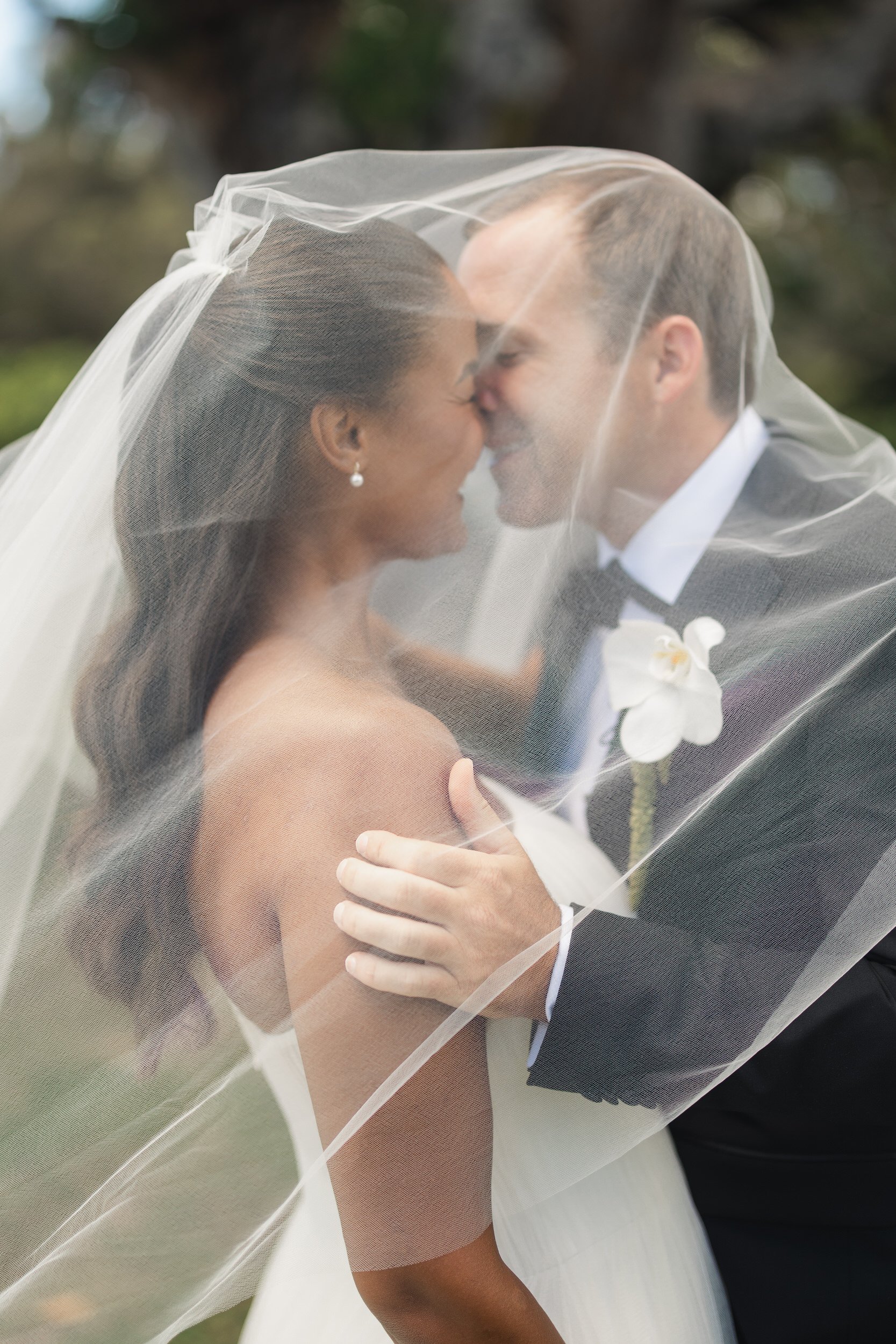 romantic couple portraits at sunset ranch hawaii overlooking the north shore of oahu