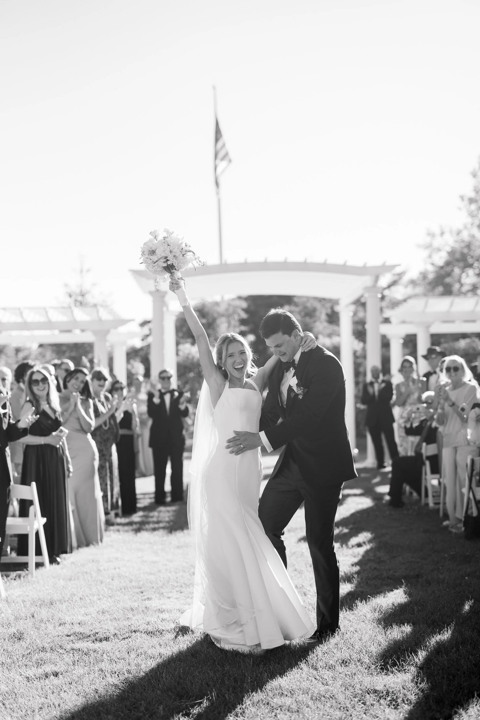 First kiss during a Cape Cod wedding ceremony