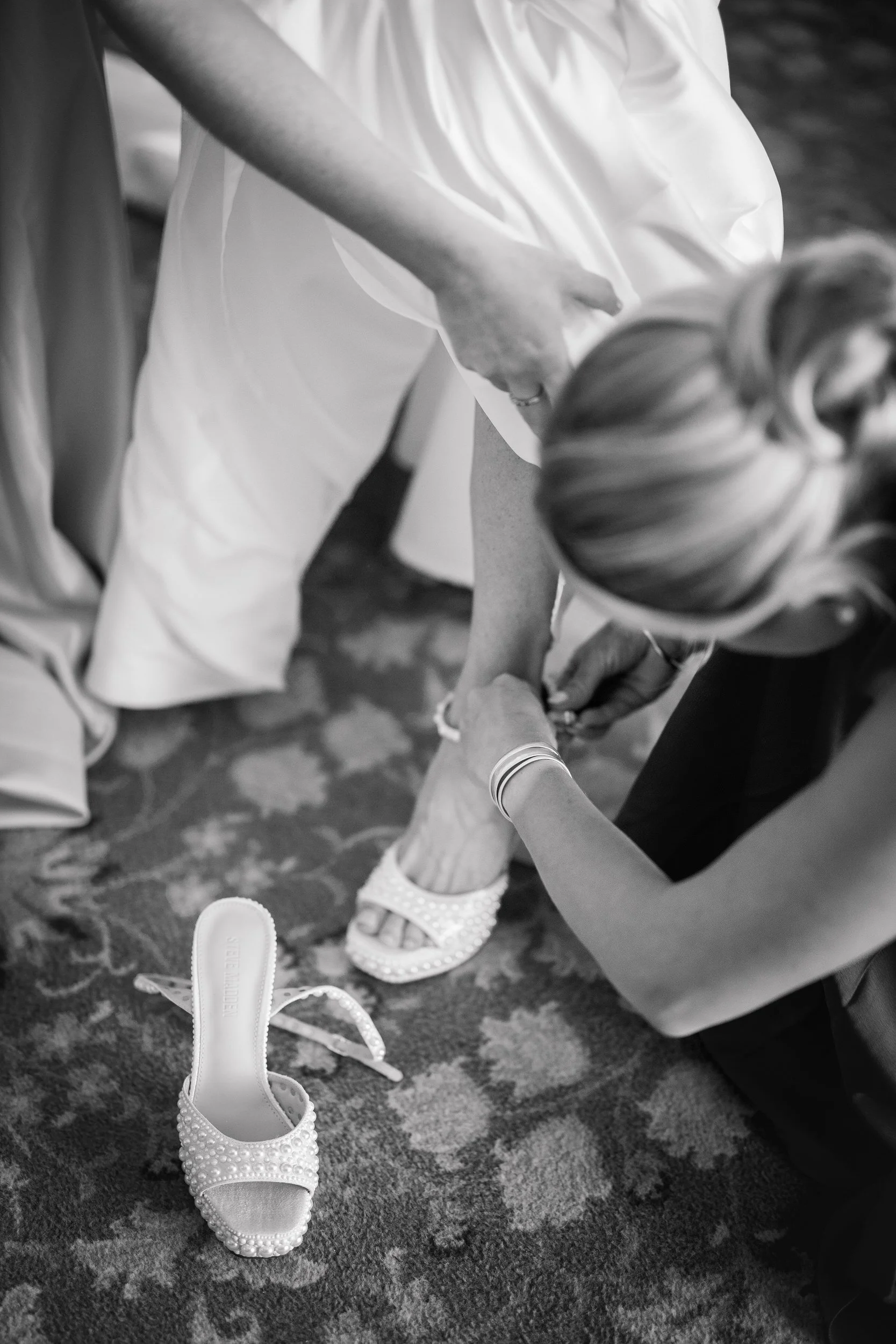 Bride getting ready with bridesmaids at Ocean Edge Resort