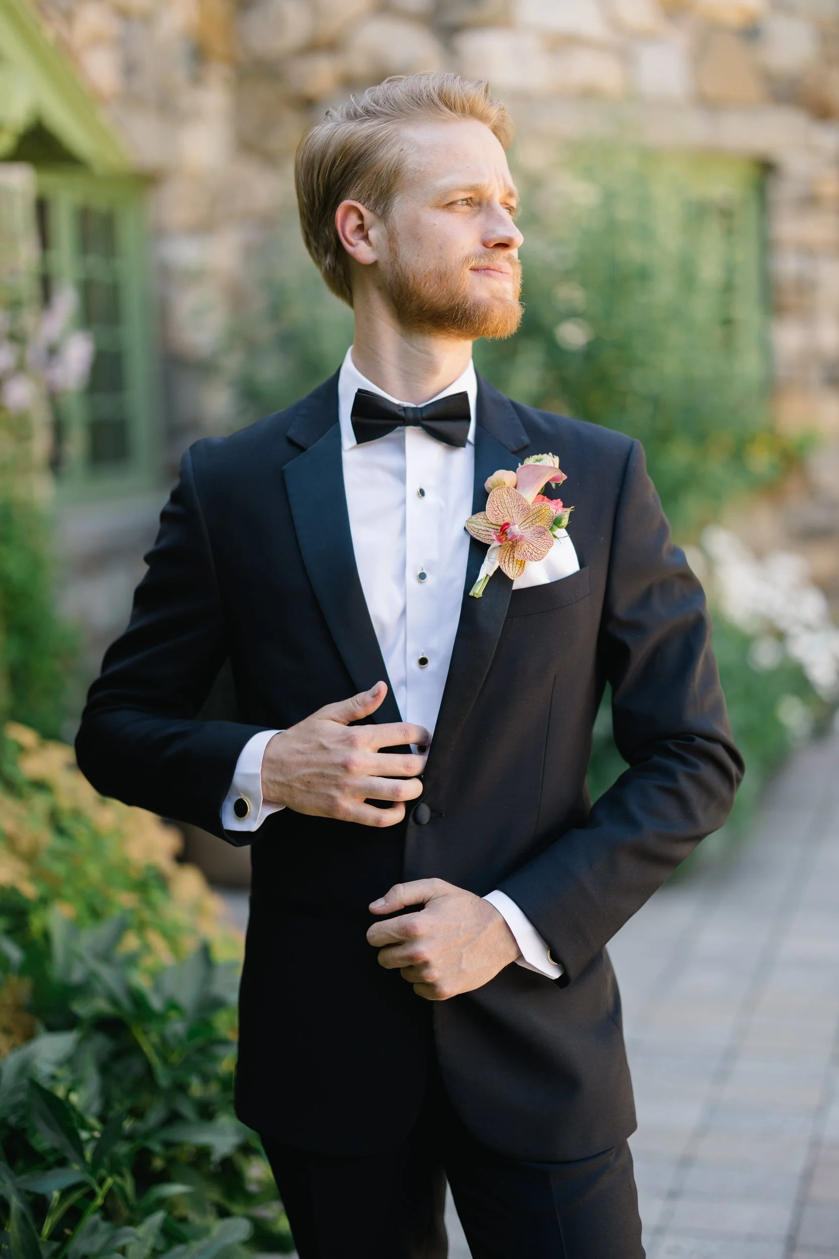 Classic groom wedding portrait in New England estate garden at Willowdale Estate Massachusetts