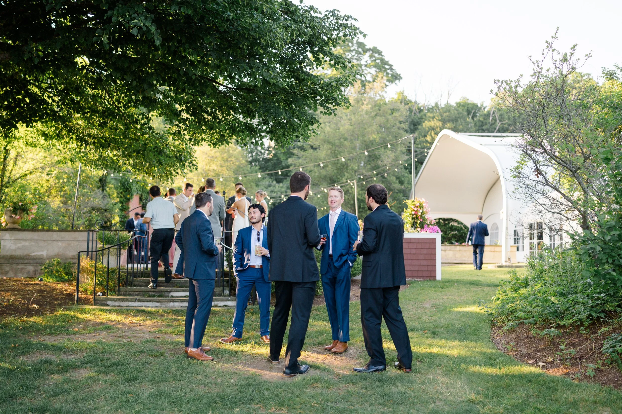 Summer wedding cocktail hour on the grounds of Misselwood Estate.