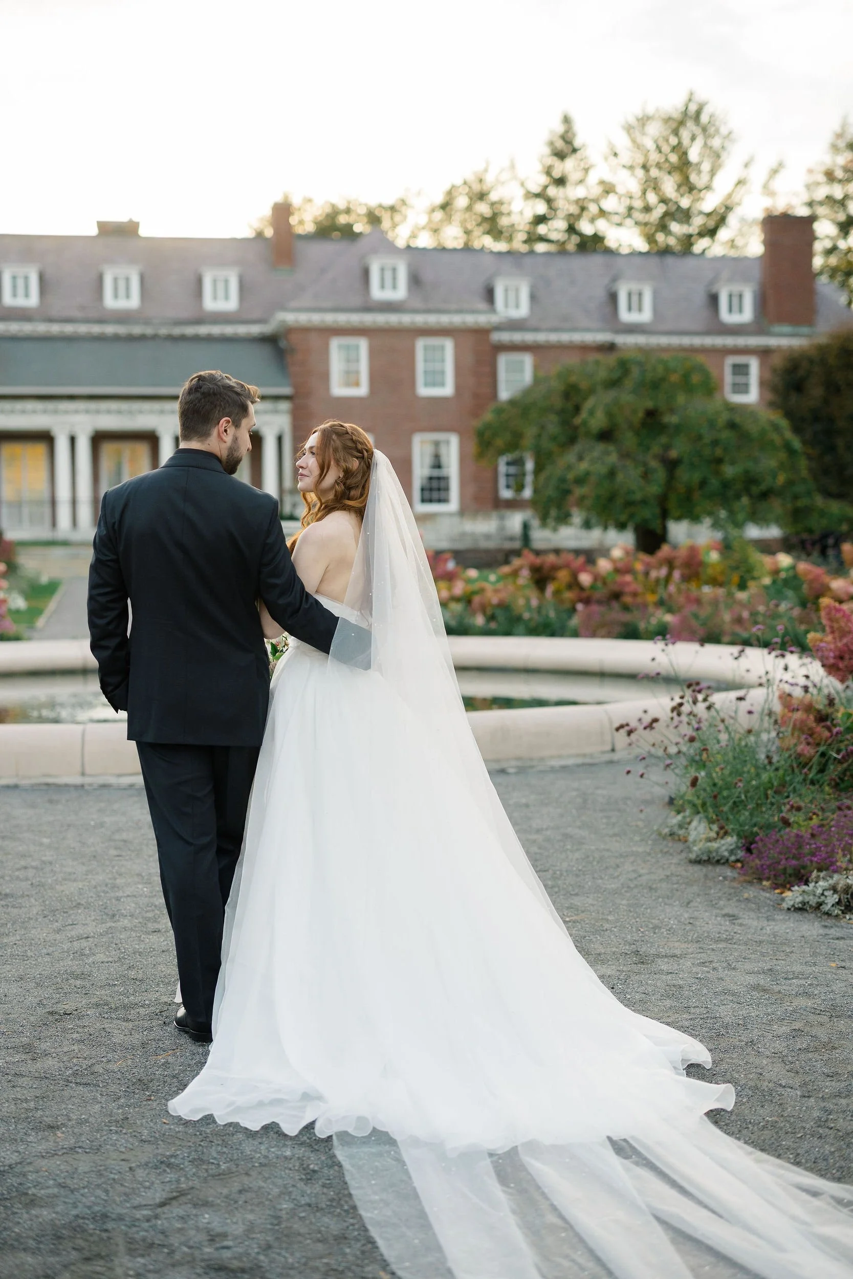 Couple's wedding portraits photographed at Elm Bank Gardens in Wellesley, Massachusetts.