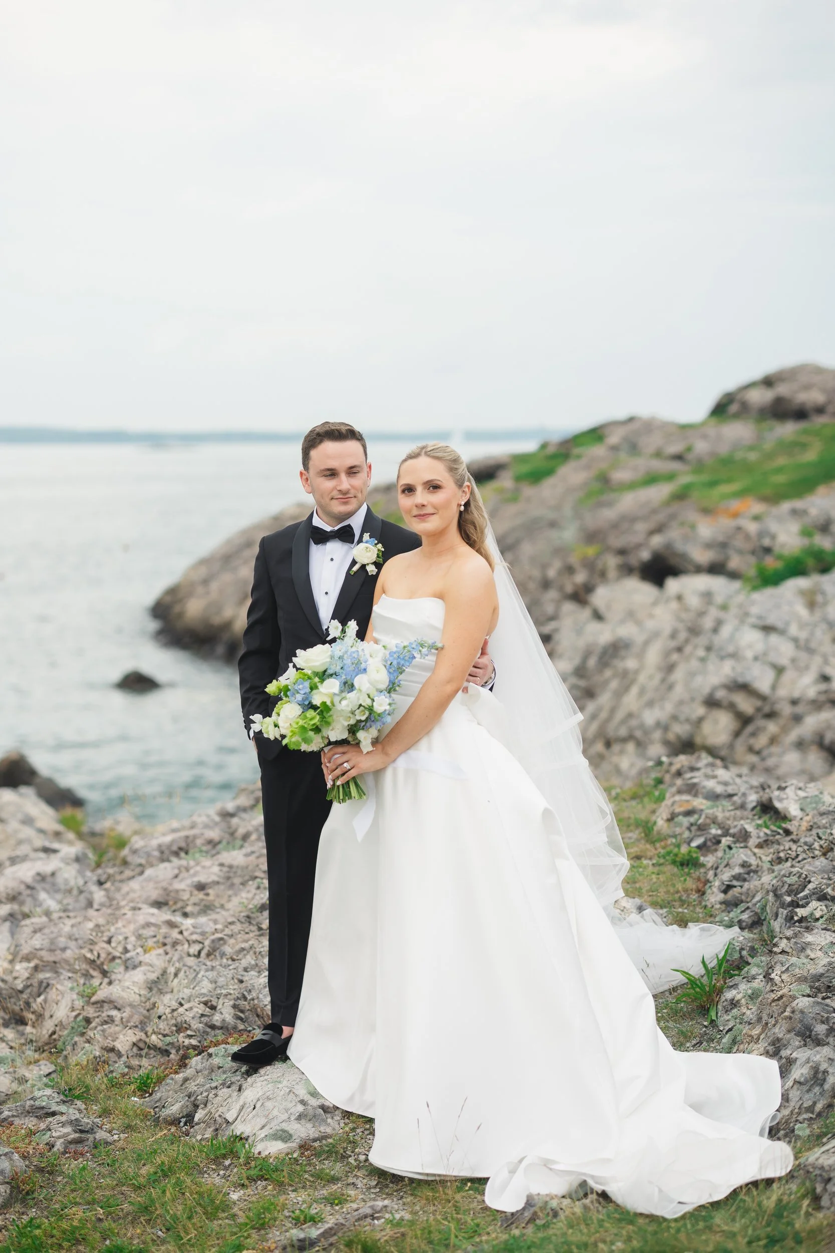 Couple portraits at Chandler Hovey Park overlooking Marblehead Harbor during a North Shore wedding.