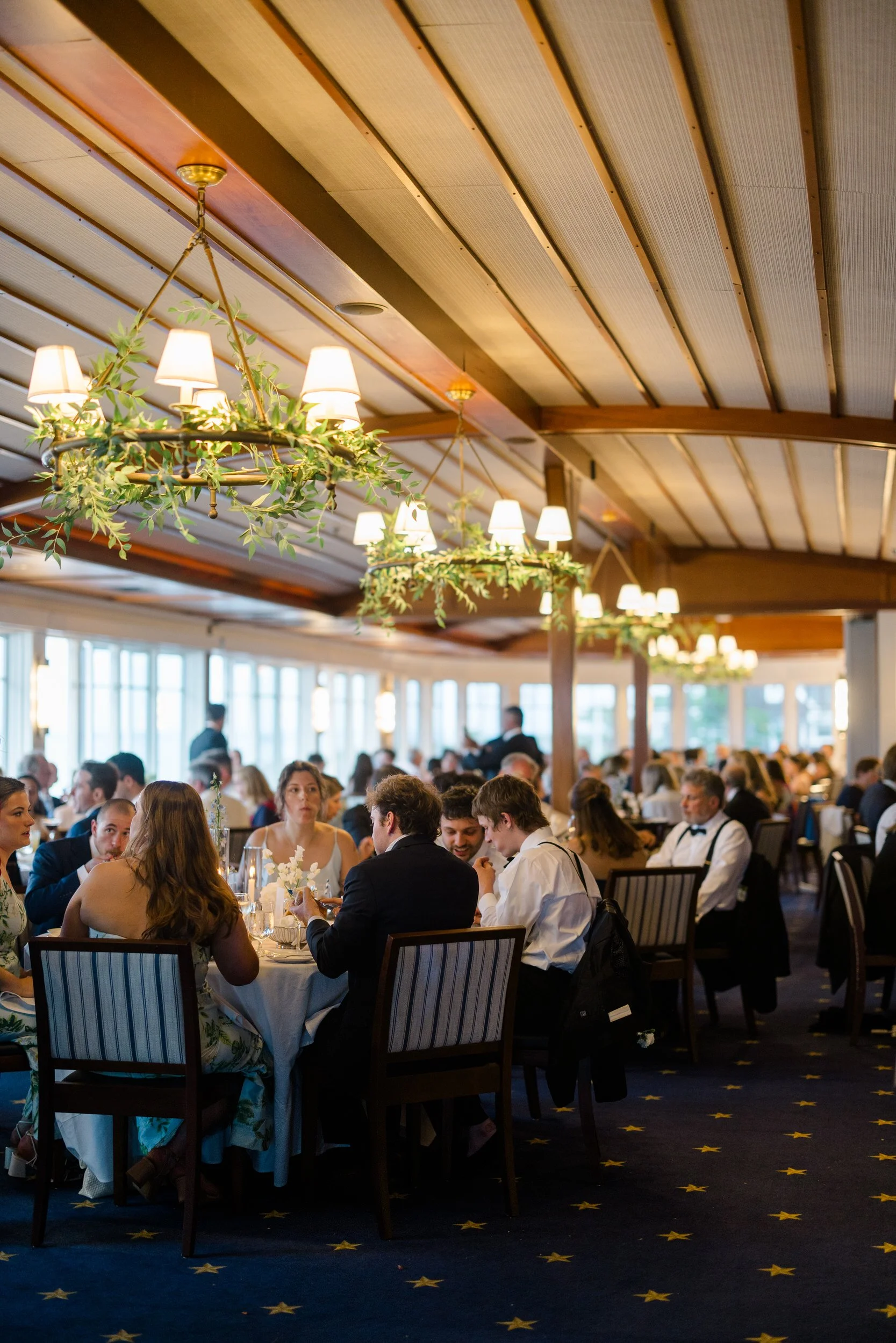 Elegant waterfront wedding reception in Marblehead filled with energy and joy.