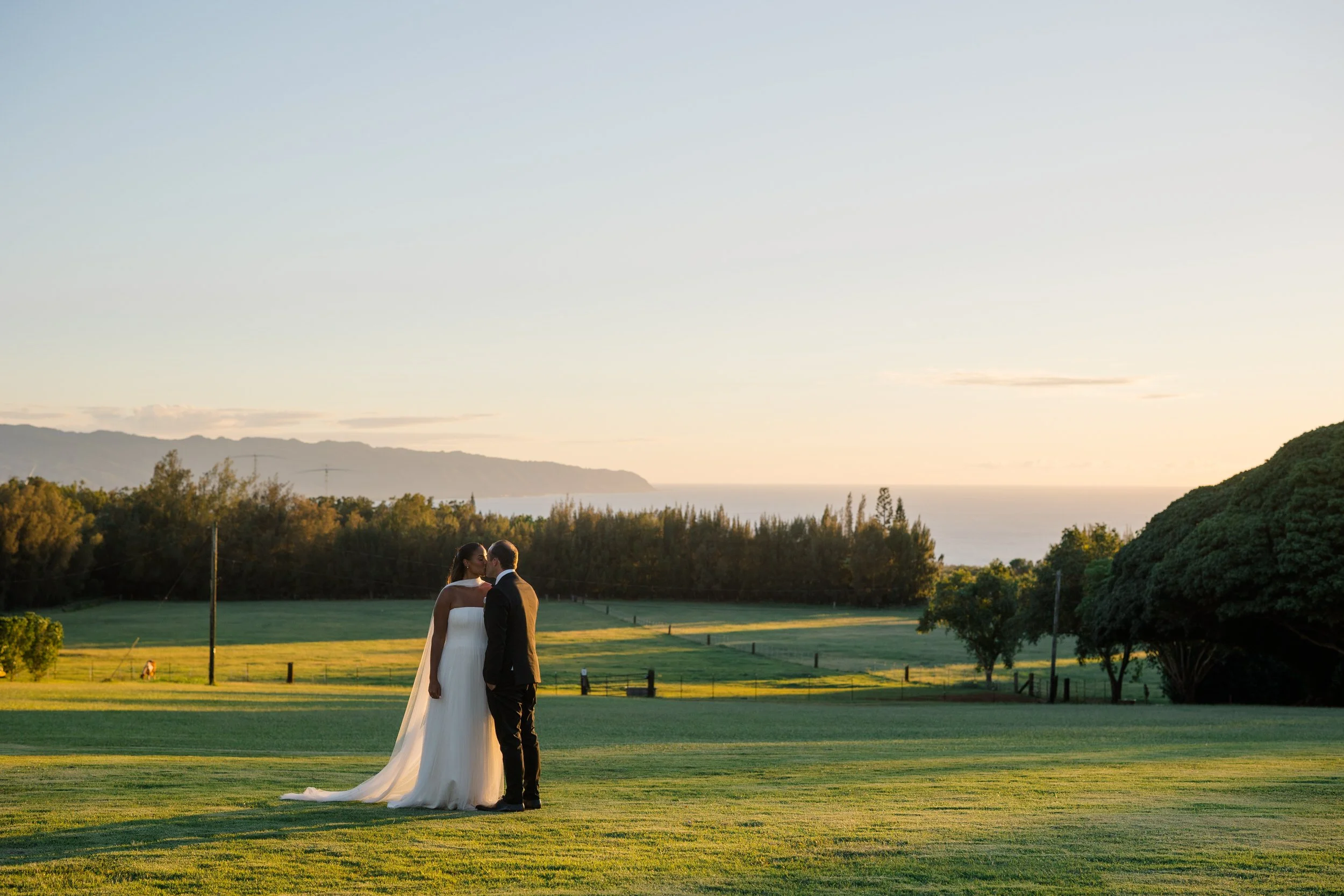 soft sunset light at sunset ranch oahu wedding