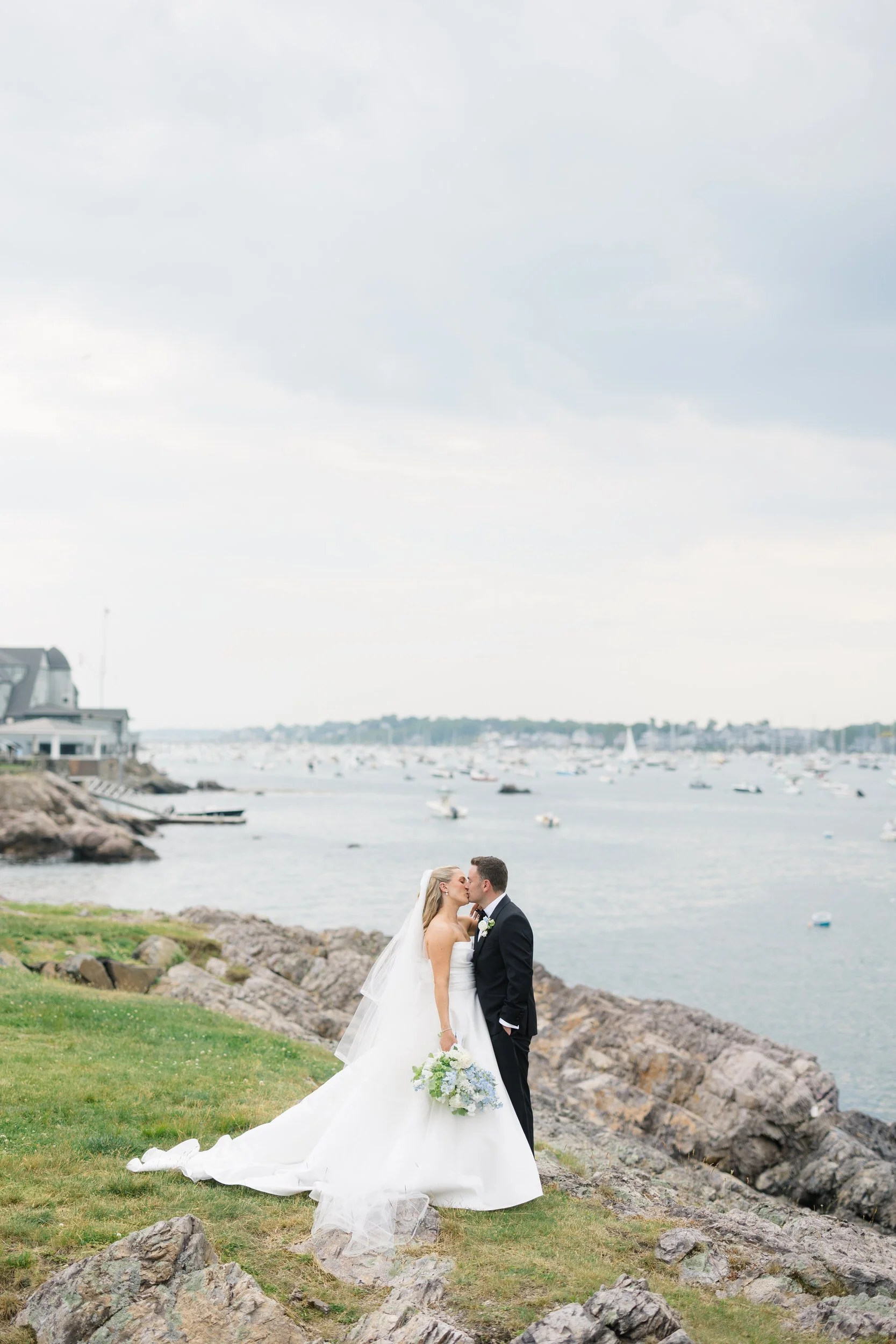 Timeless New England wedding portraits overlooking the coastline at Chandler Hovey Park.