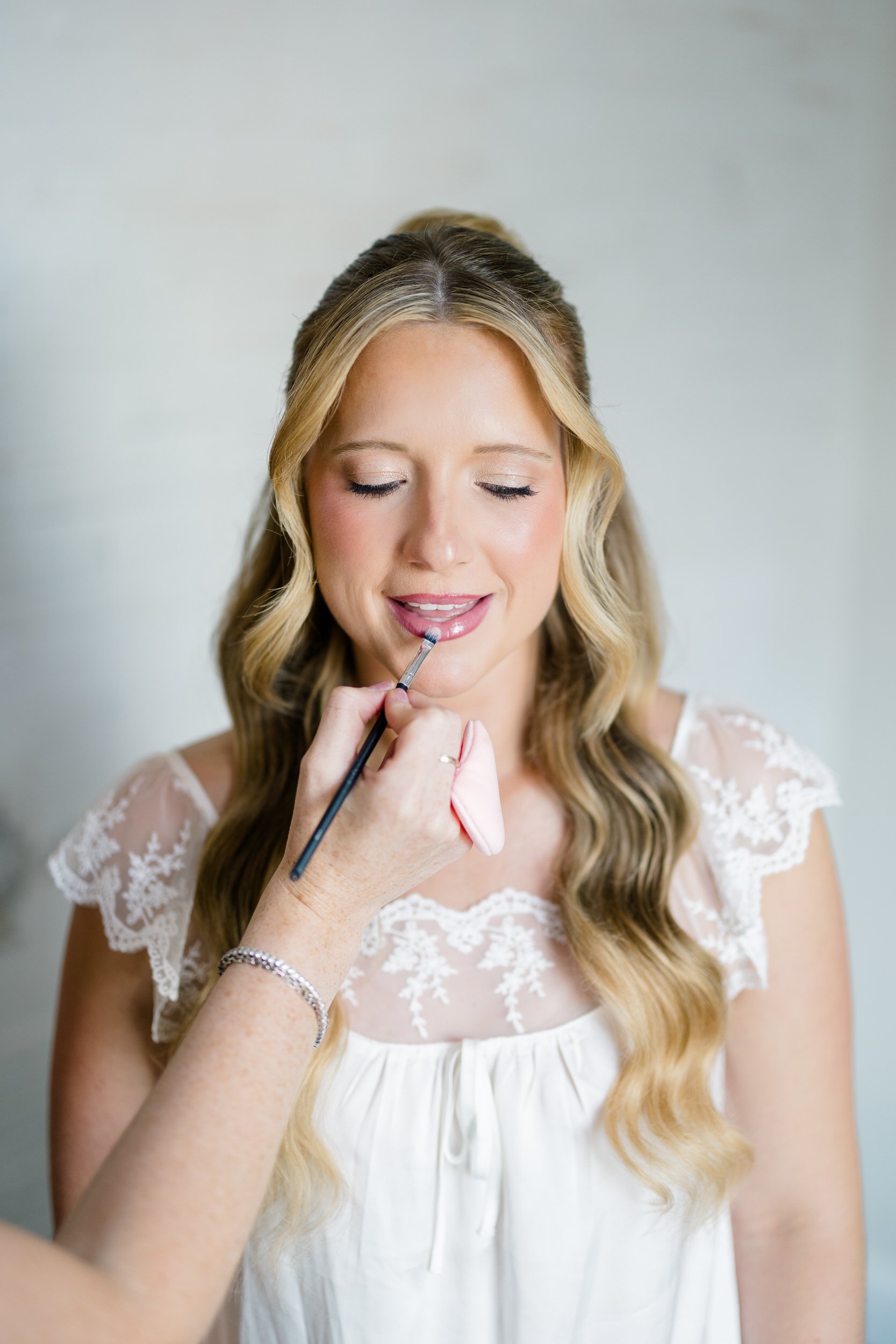 Bride preparing for her wedding day at Hotel Commonwealth in Boston