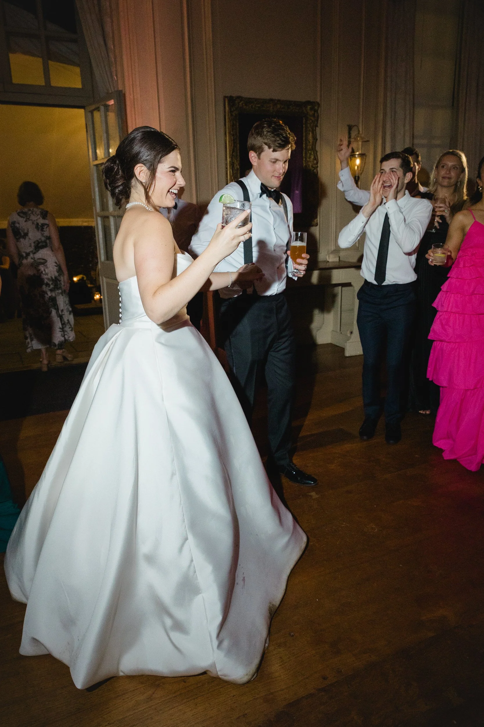 Packed dance floor during an energetic wedding reception at Castle Hill on the Crane Estate in Ipswich, Massachusetts.