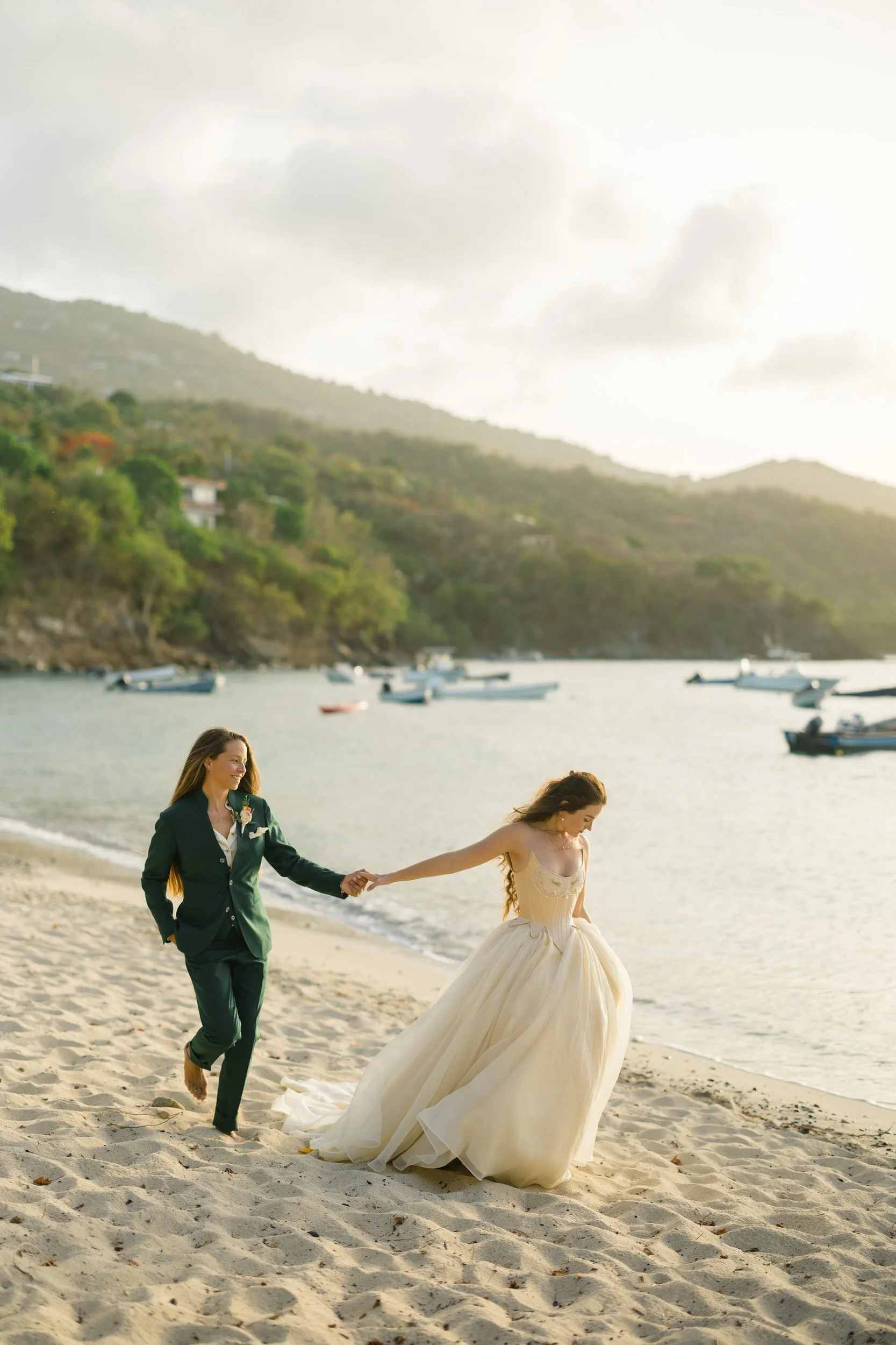 Queer newlywed portraits overlooking the Caribbean at sunset.