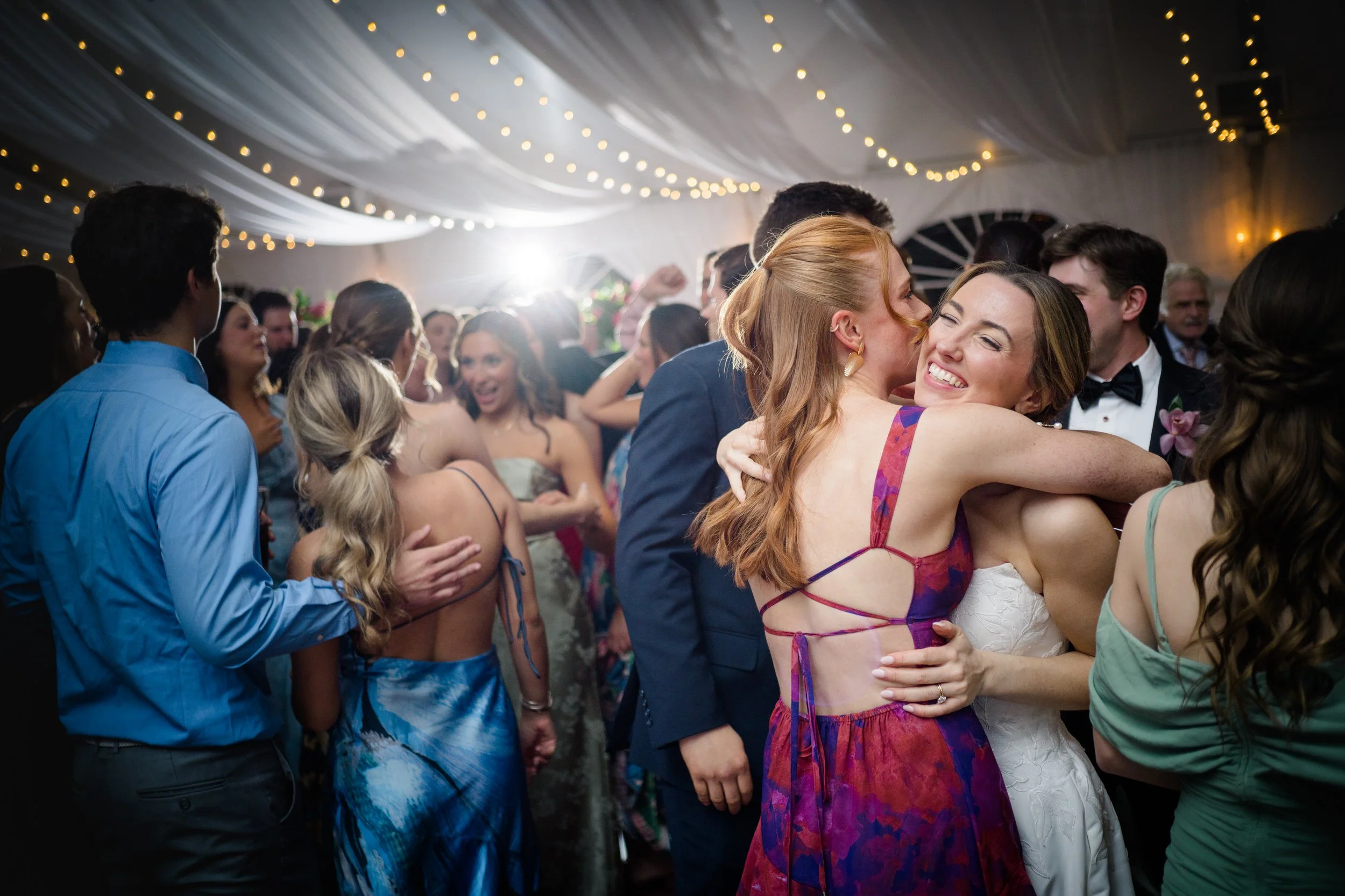 Joyful candid dancing moments at coastal New England wedding