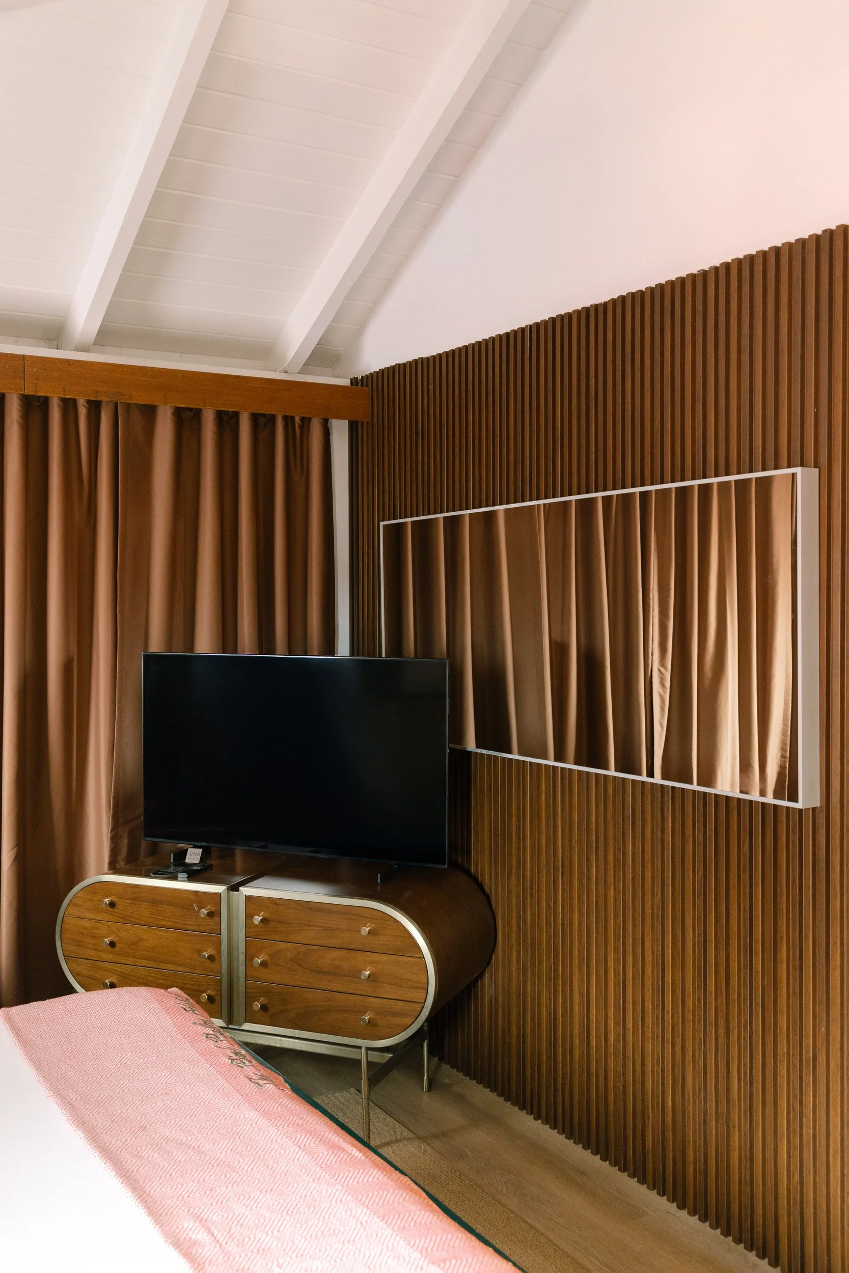 Pink midcentury modern-inspired interior at The Pink Palm Hotel in St. Thomas