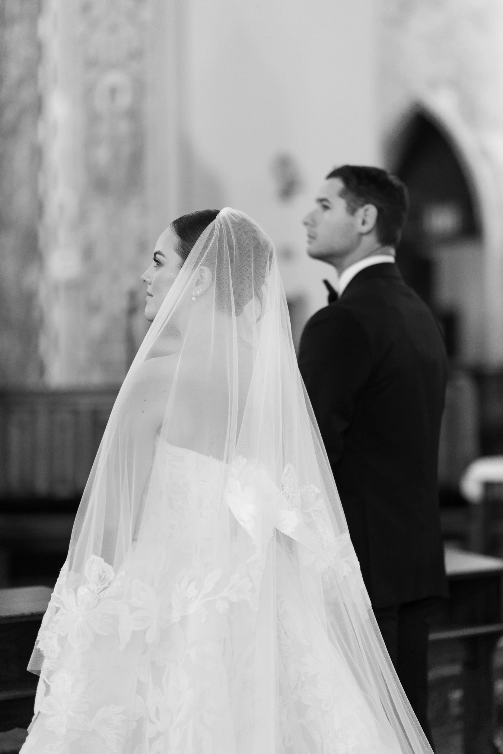 Wedding ceremony inside St. Lawrence Martyr Parish before the Cape Cod private estate reception.