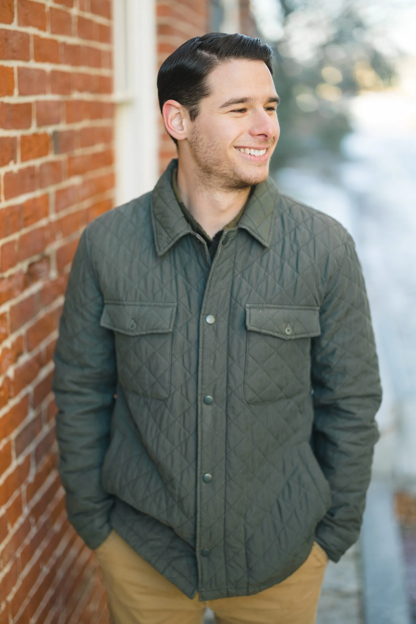 Quiet, documentary-style moments from a Newburyport engagement session in winter.