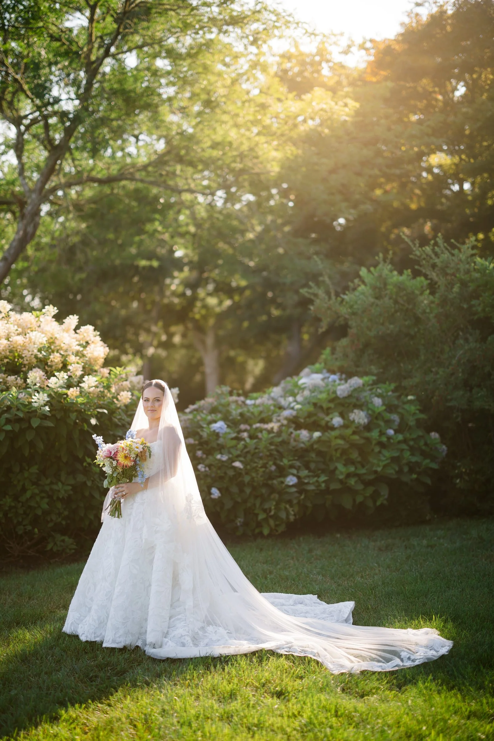 Bride wearing a Jenny Yoo wedding gown at a Cape Cod private estate wedding.