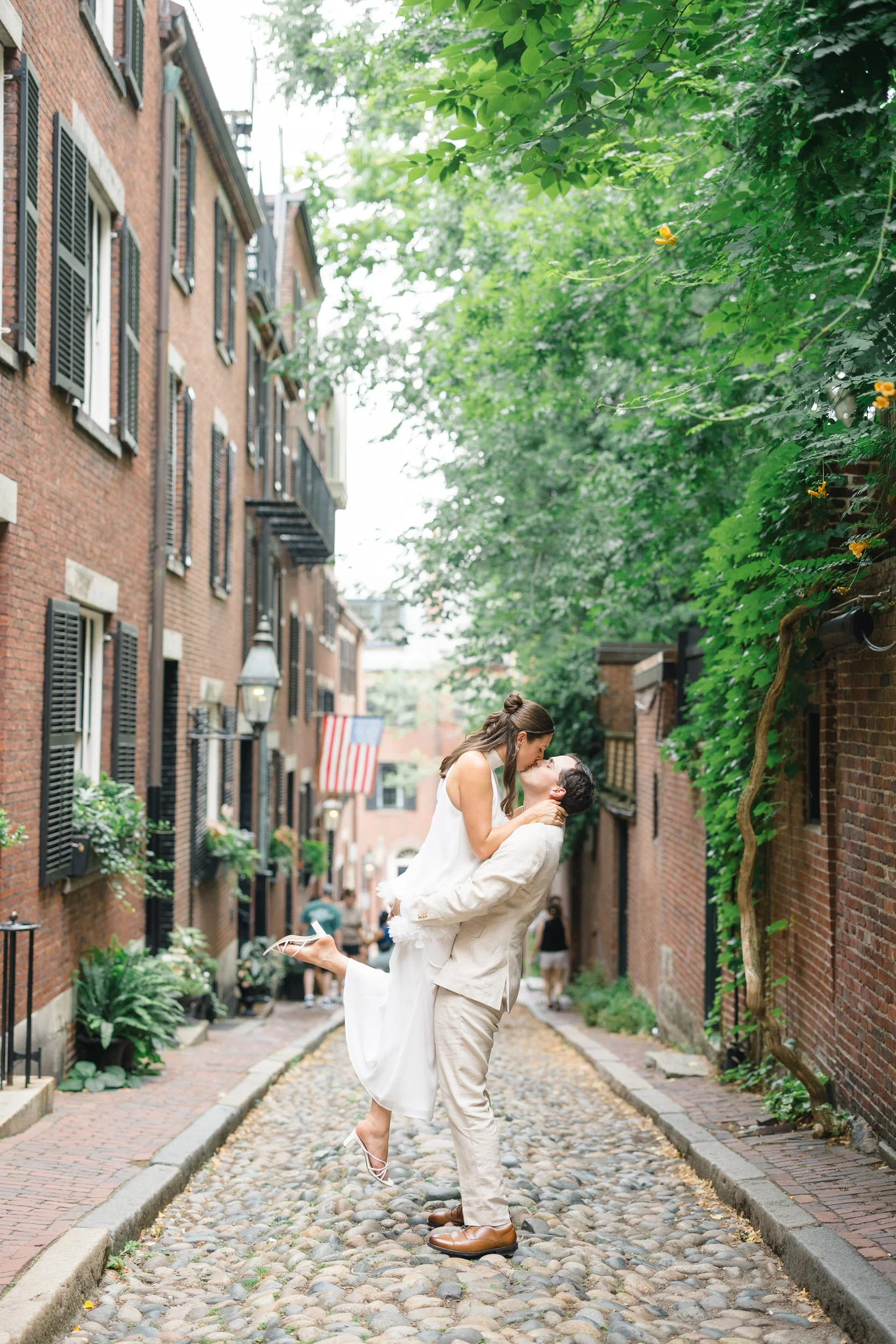 Romantic engagement portraits on Boston's iconic Acorn Street.