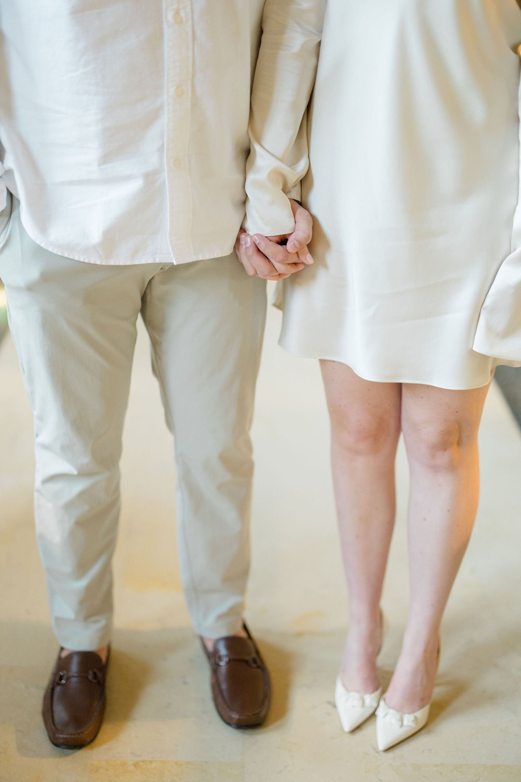 Engagement photos at the Boston Public Library showcasing classic architectural details