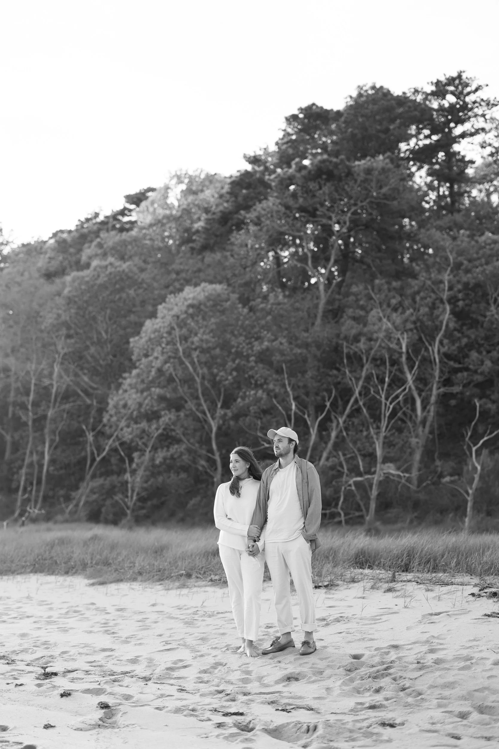Chatham Cape Cod engagement session beach portraits with windblown hair and natural movement.