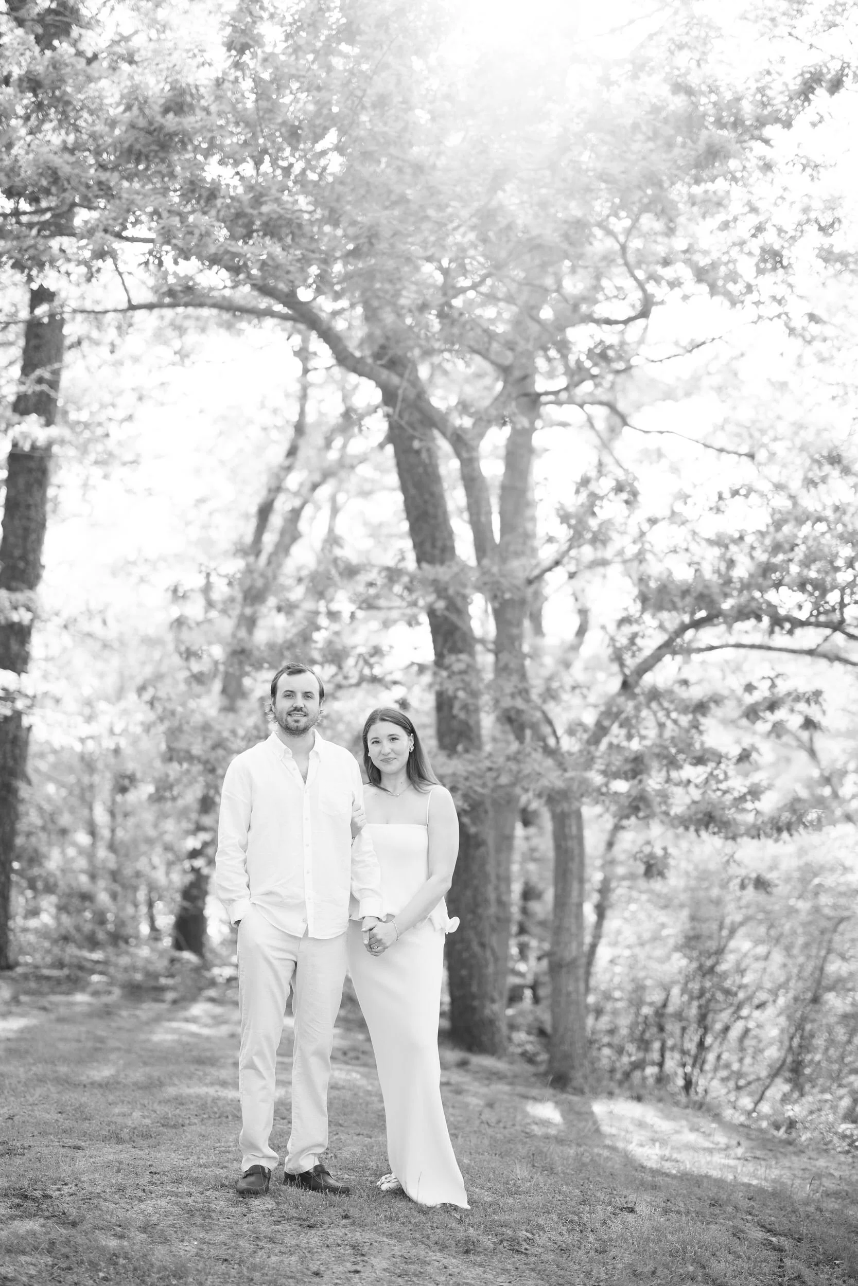 Cape Cod engagement photos at a charming cottage in Chatham with soft textures, neutral tones, and coastal chic aesthetic.