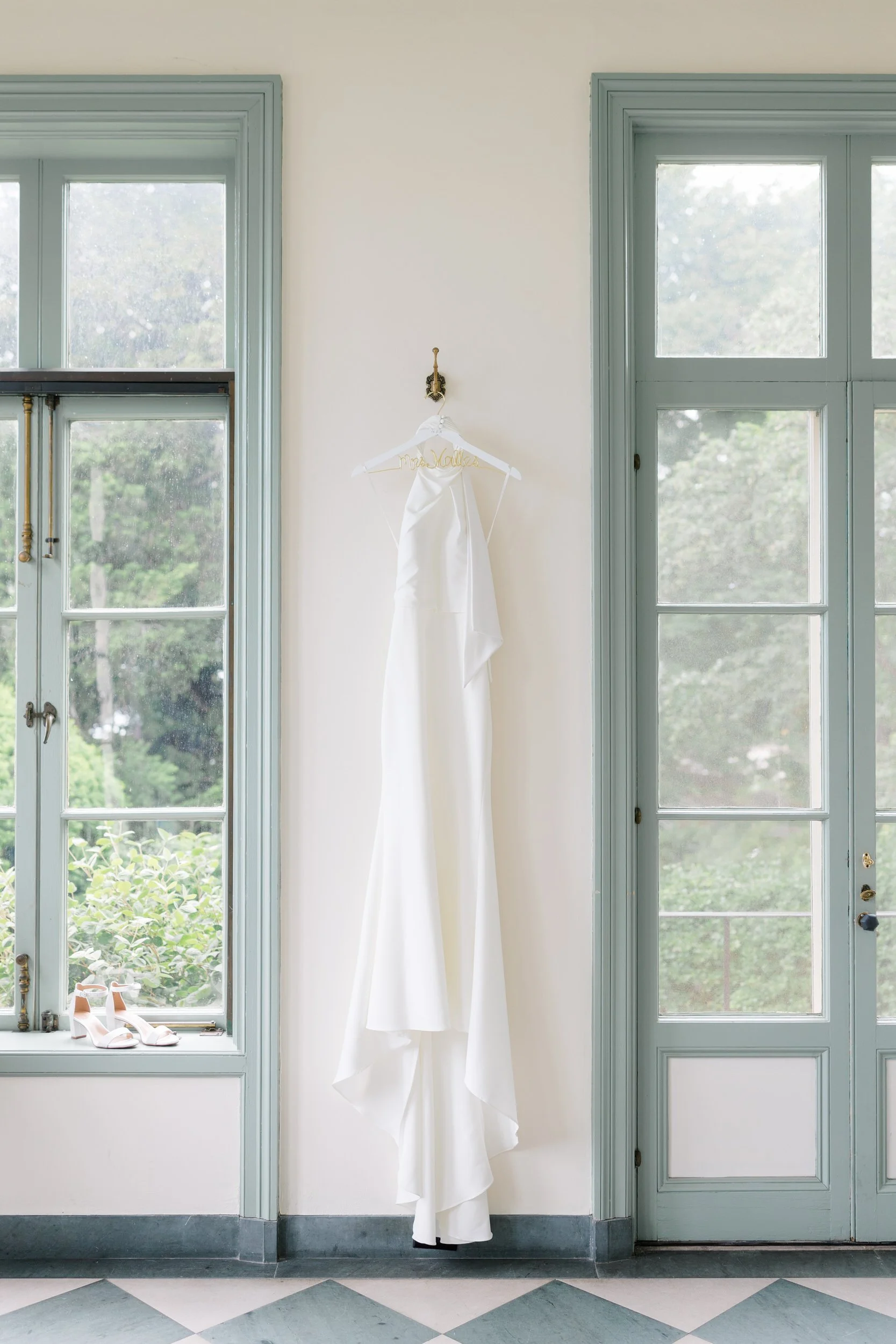 Wedding day details styled with white blooms and coastal-inspired textures.