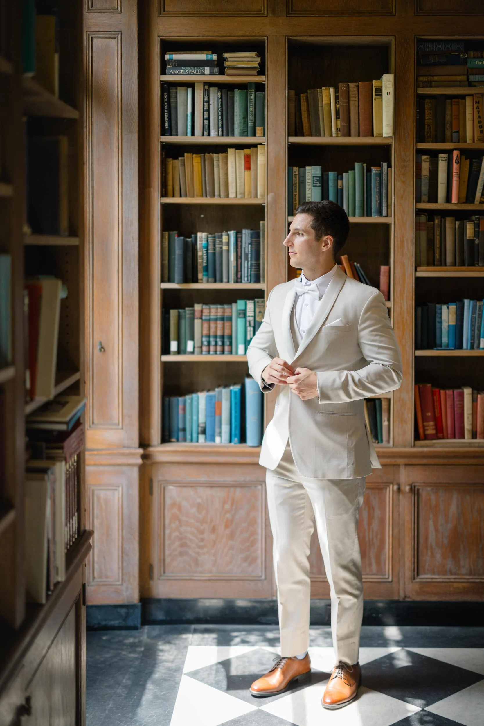 Groom getting ready with his groomsmen before the ceremony.