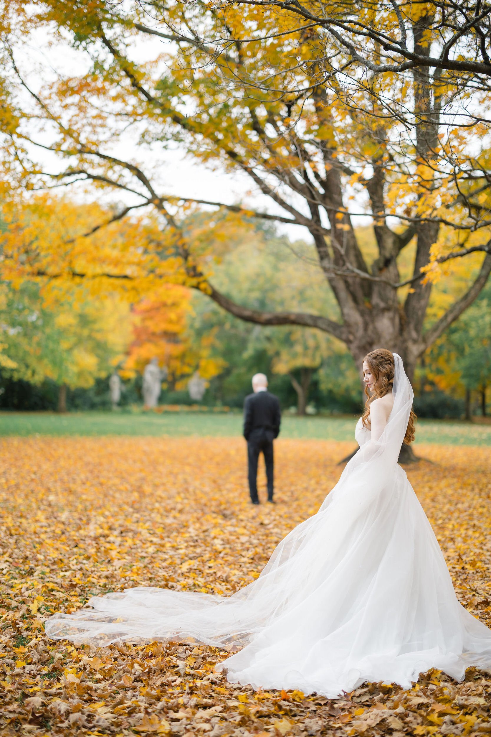 Emotional first look between a bride and her father at an autumn wedding in Massachusetts.