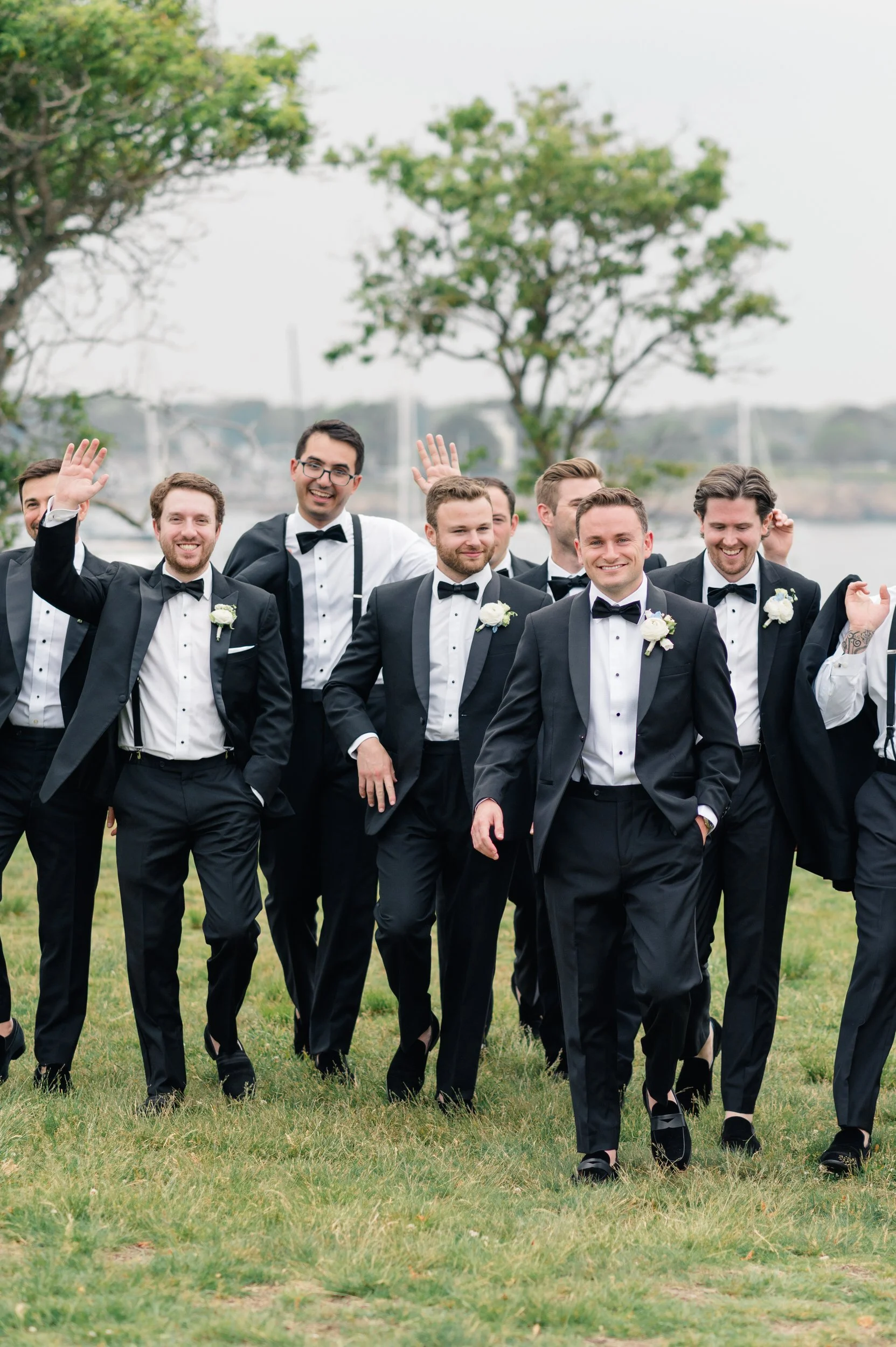 Wedding party portraits overlooking Marblehead Harbor at Chandler Hovey Park.