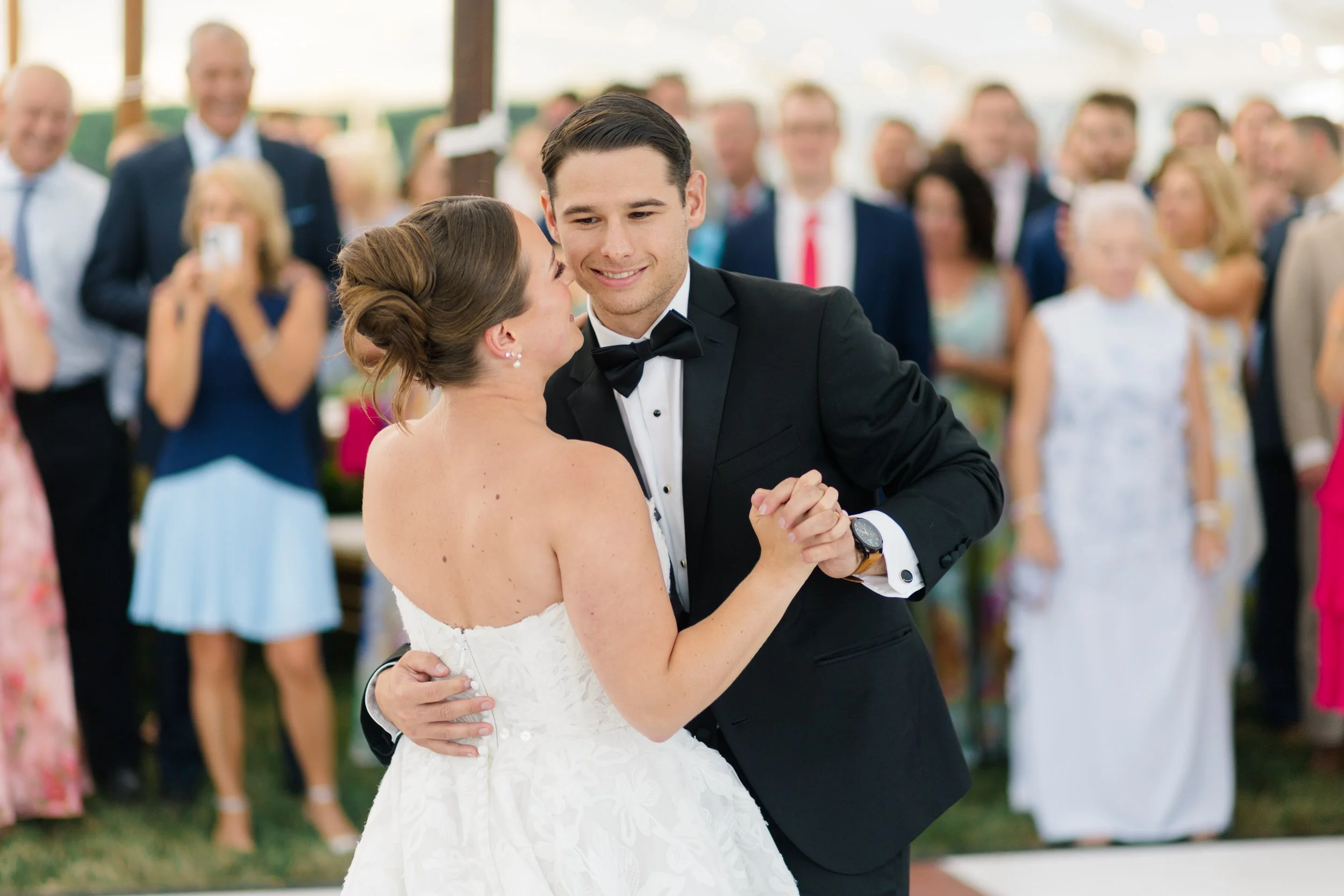 Bride and groom celebrating on the dance floor.