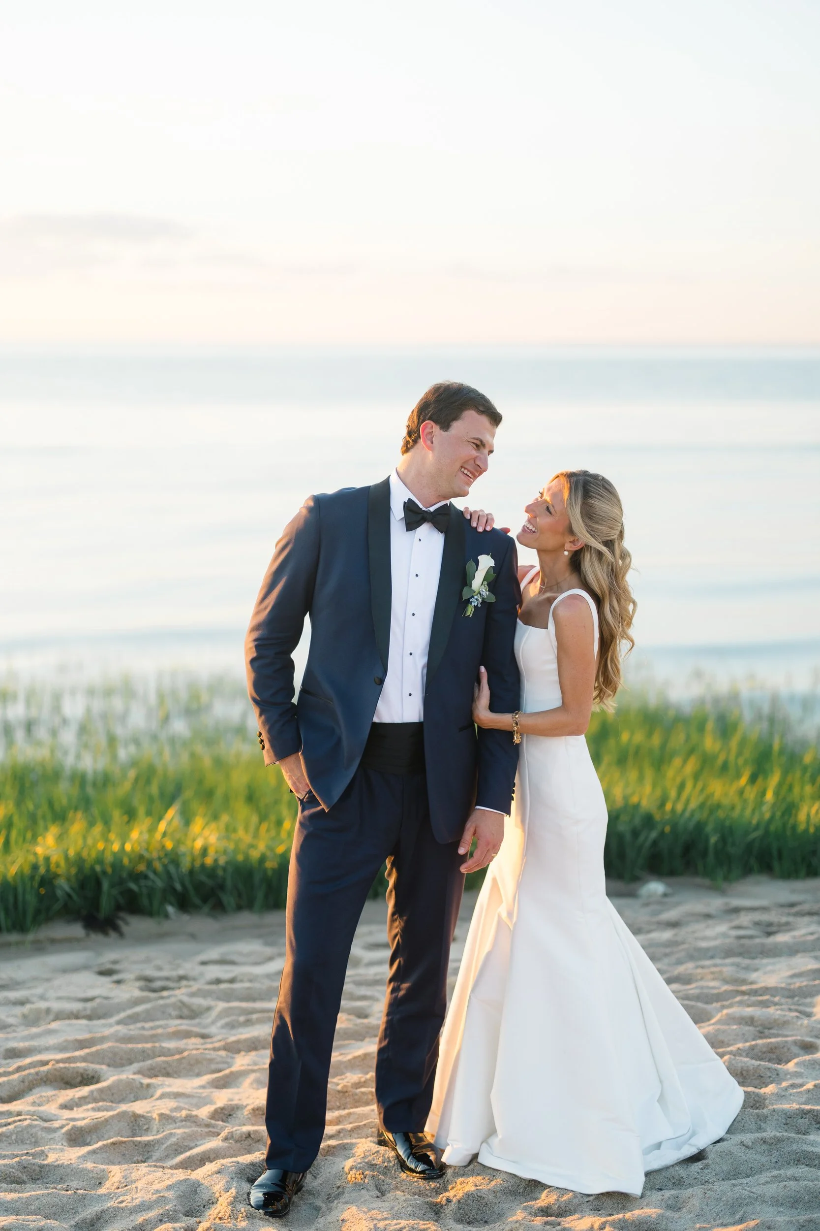 Golden hour beach portraits at Ocean Edge Resort wedding