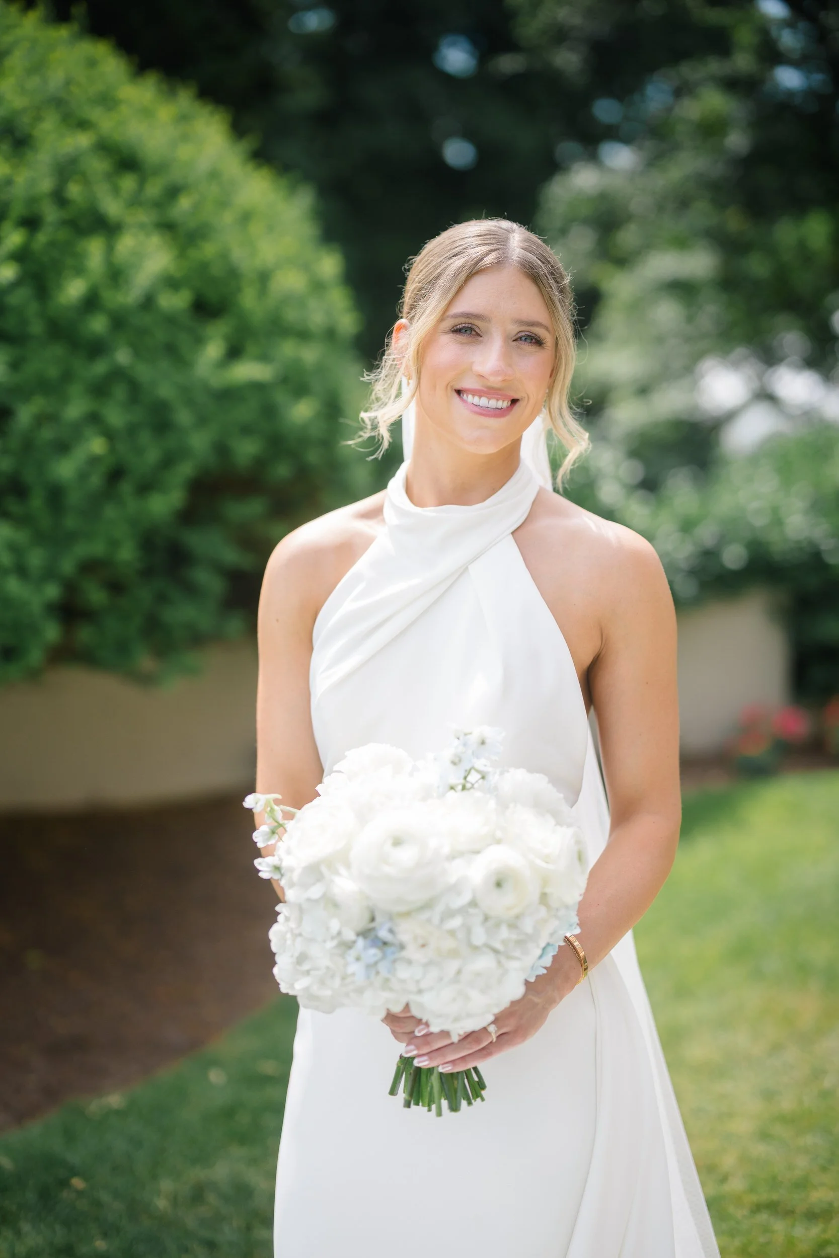 Romantic bridal portraits captured in the gardens of Misselwood Estate during a coastal summer wedding.