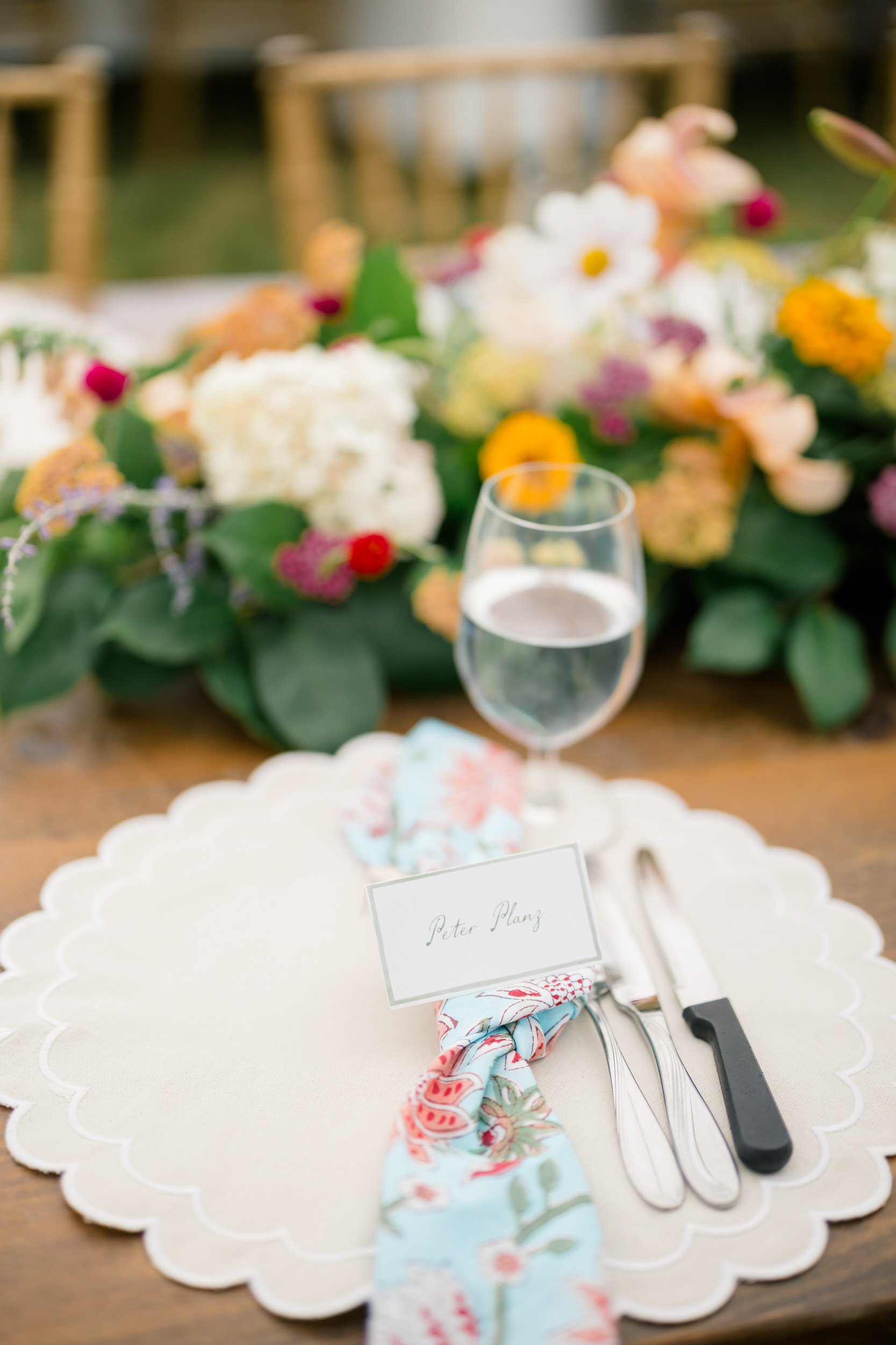 Tented wedding reception with wildflowers and hydrangeas.