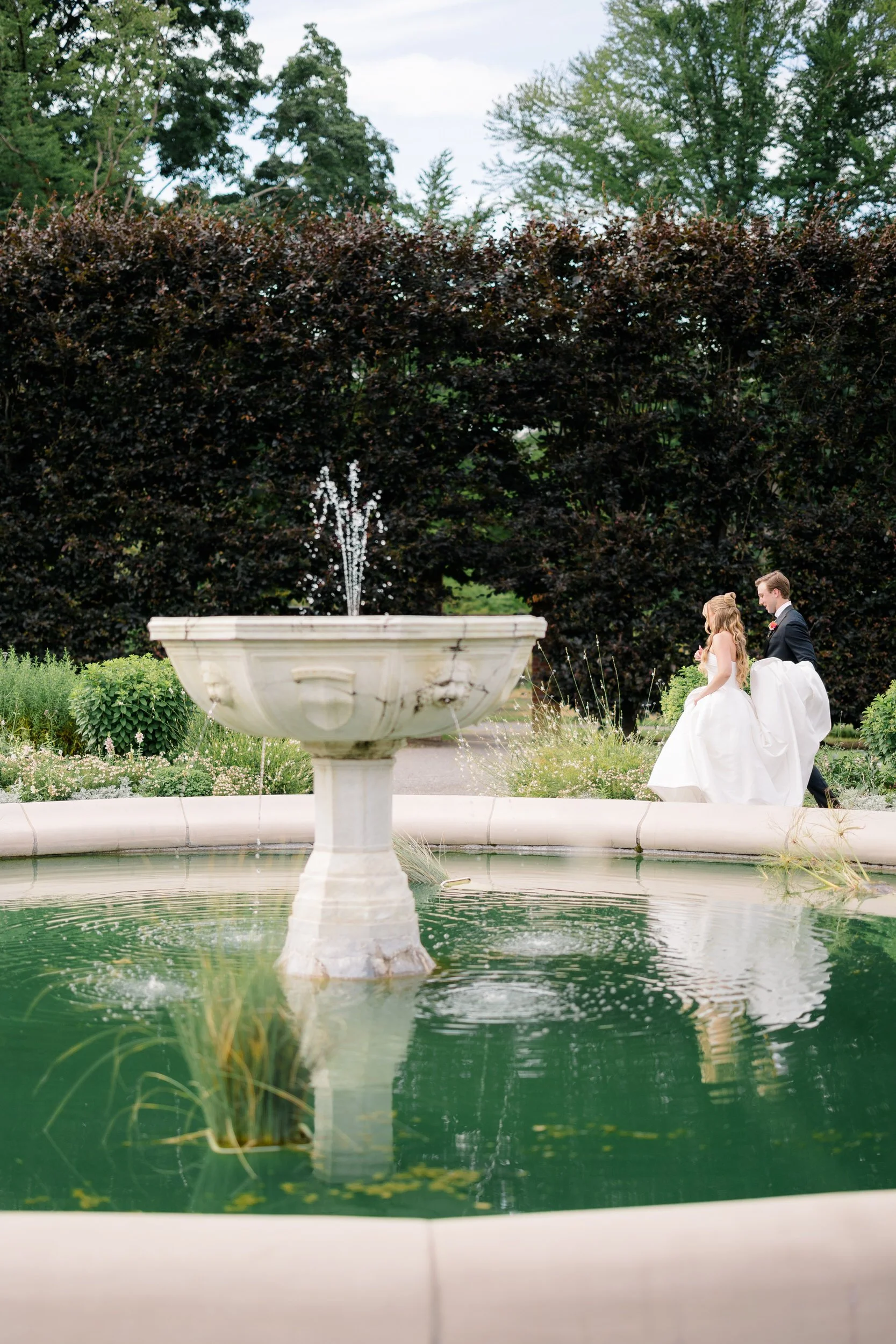 Bride and groom portraits in the Italian Gardens at Elm Bank