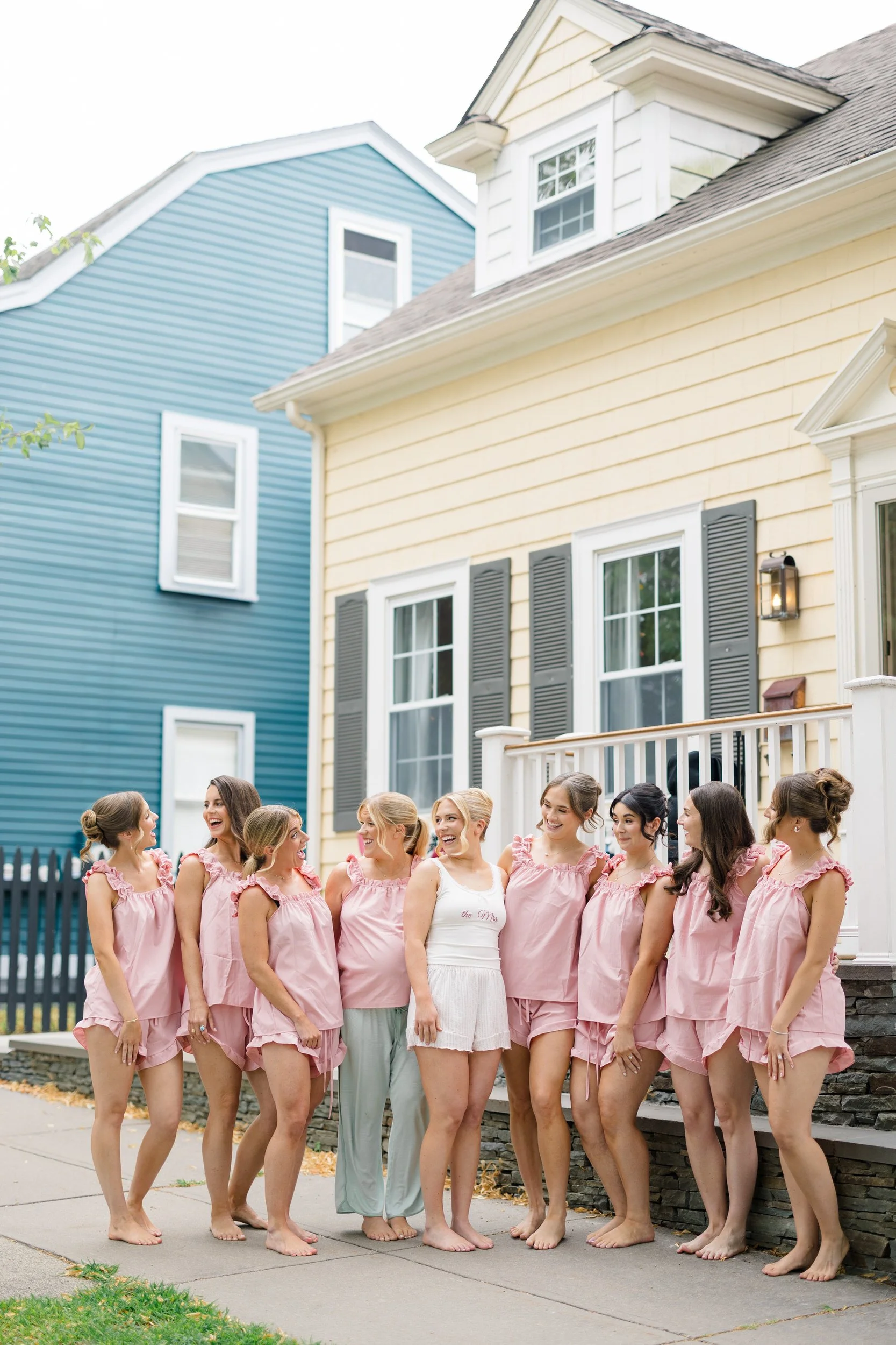 Documentary-style photograph of the bride getting ready with her bridesmaids before the ceremony.