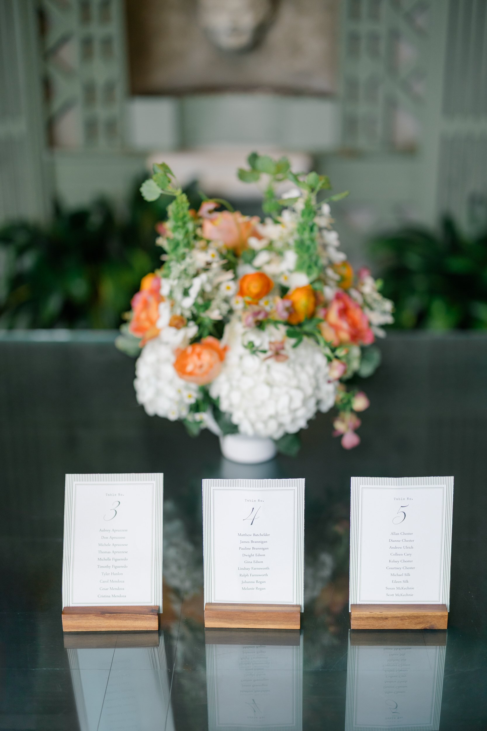 Colorful cocktail hour décor with wildflower-inspired florals at Blithewold Mansion.