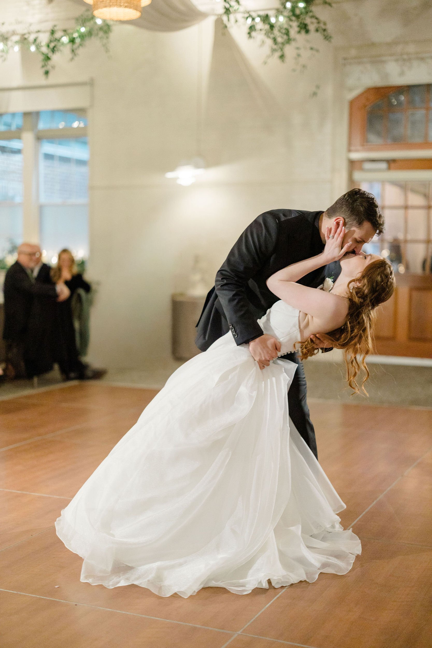 Romantic reception celebration at a secret garden inspired wedding in Massachusetts.
