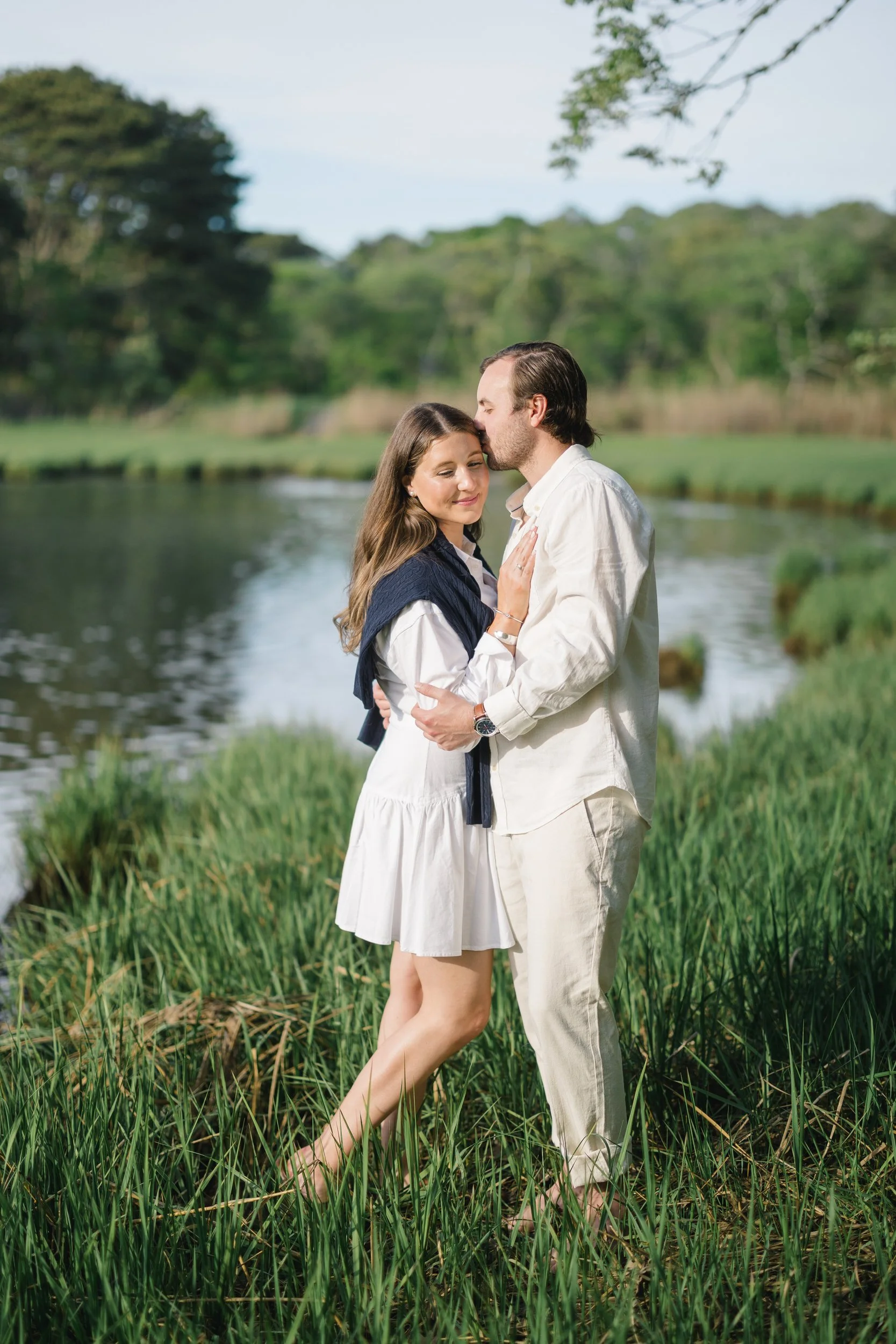 Chatham Cape Cod engagement session with couple standing in dune grass wearing Ralph Lauren inspired outfits.