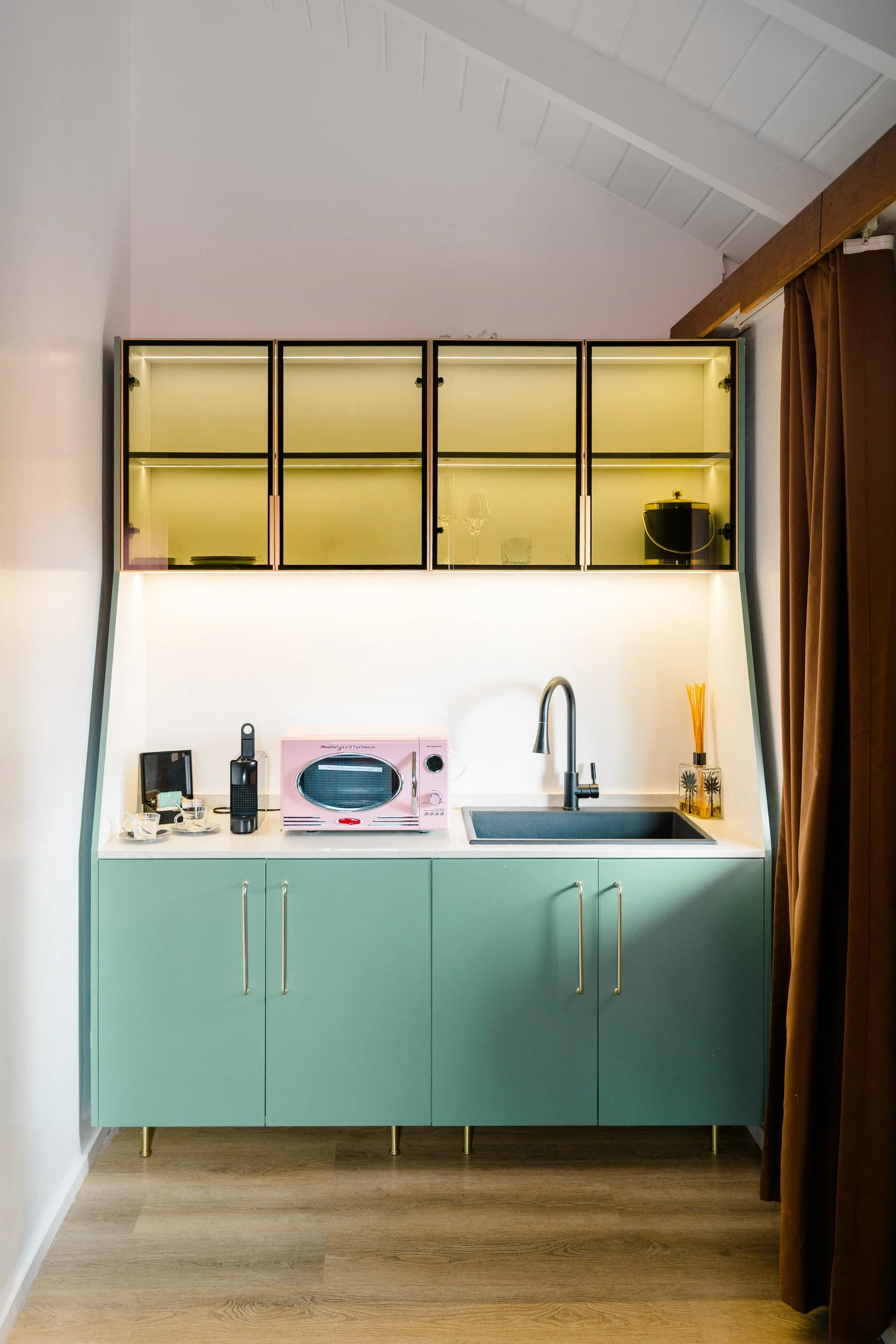 Midcentury modern-inspired details and pink decor at The Pink Palm Hotel