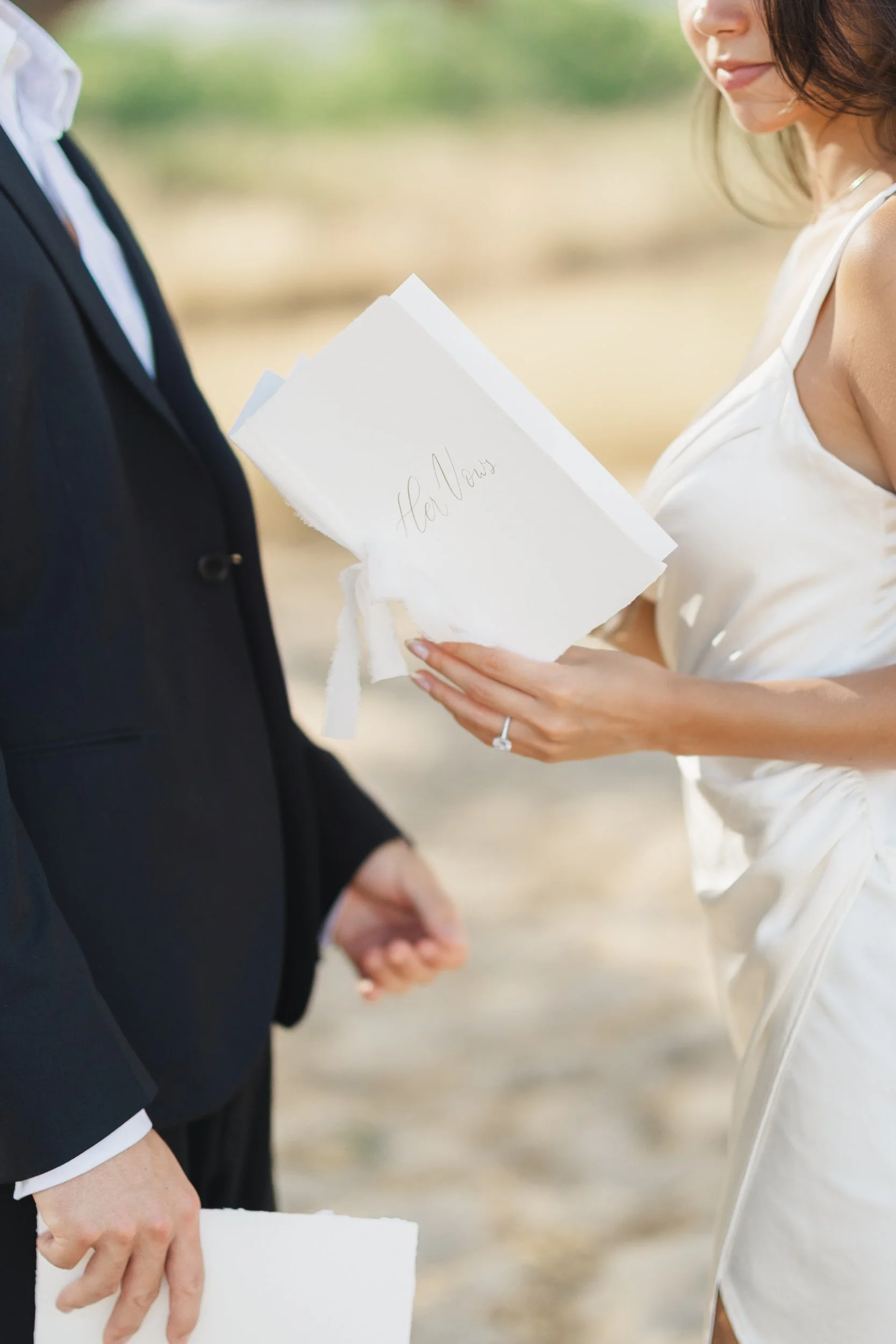 Sunrise wedding vows on quiet Oahu beach