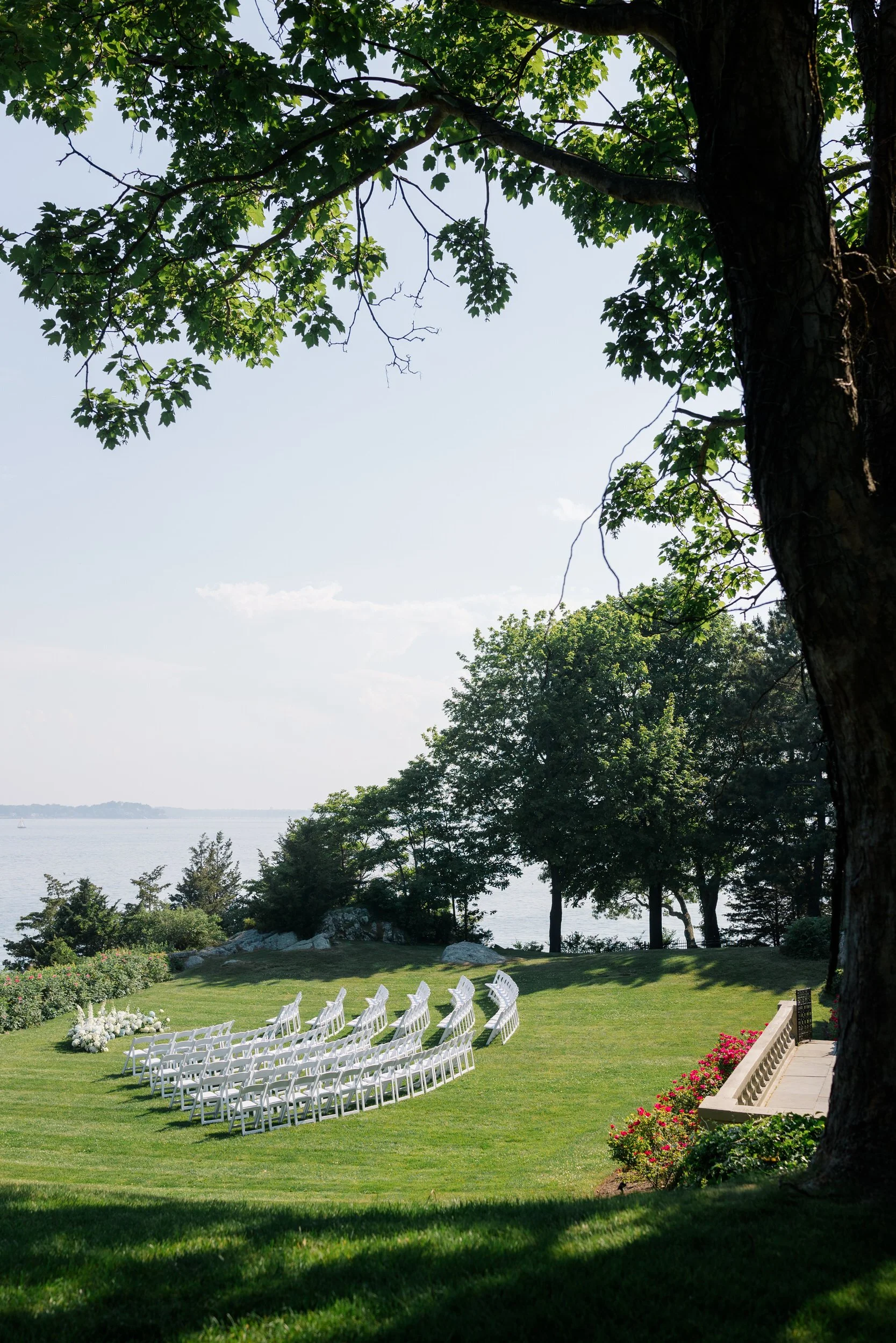 Garden-inspired ceremony design overlooking the ocean at Misselwood Estate.