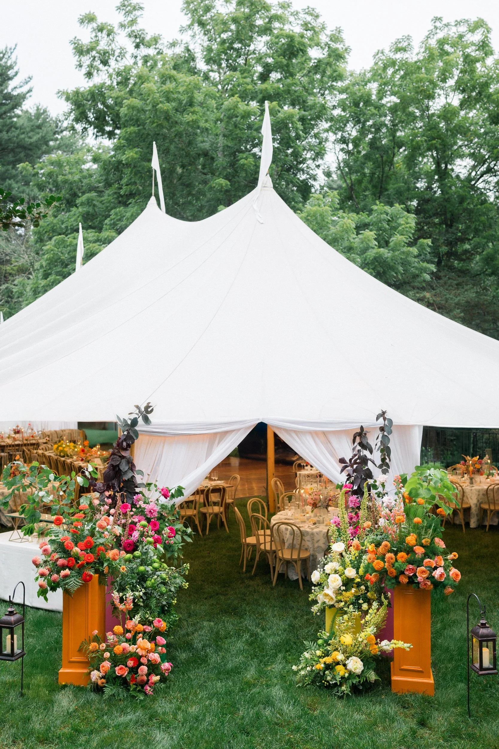 Colorful Connors Center reception featuring vibrant floral installations and whimsical garden-inspired details.