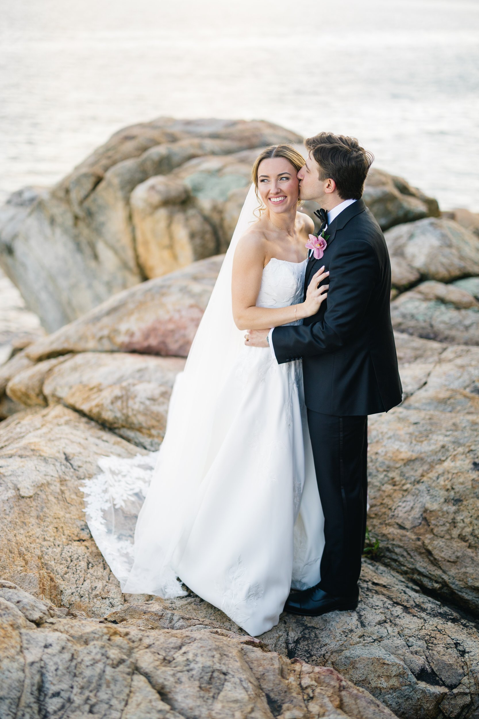 Luxury waterfront wedding portraits at sunset in Beverly Massachusetts