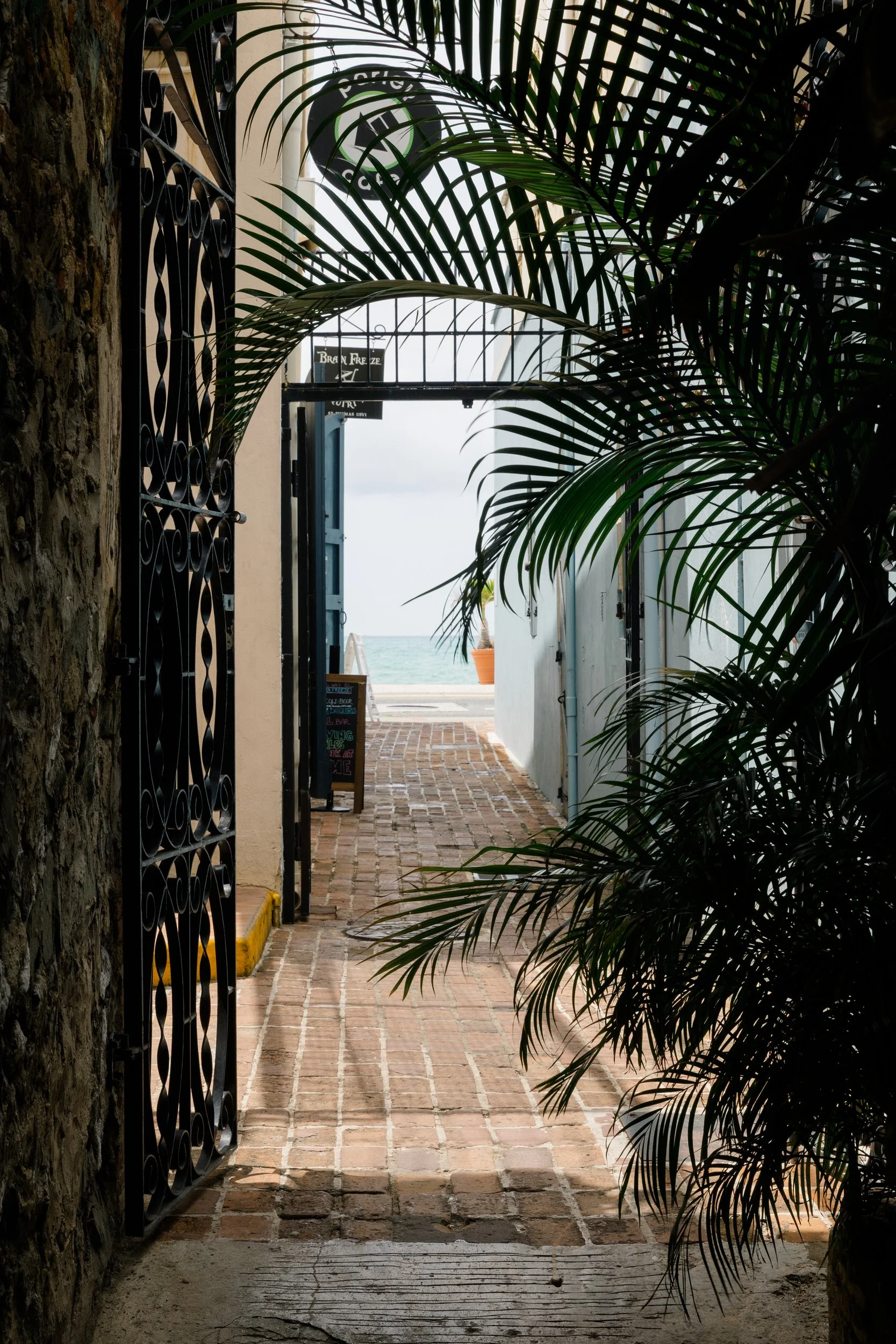 Vibrant tropical plants and colorful Caribbean architecture in St. Thomas